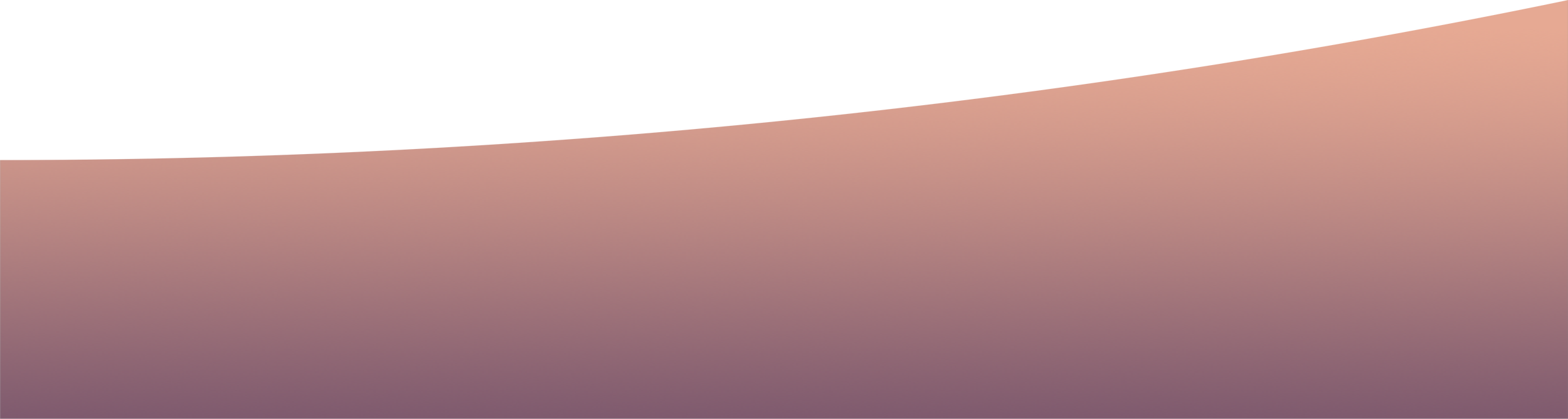 Close-up of a person's hand with a gradient pink and purple nail polish, resting on a pink and purple surface.