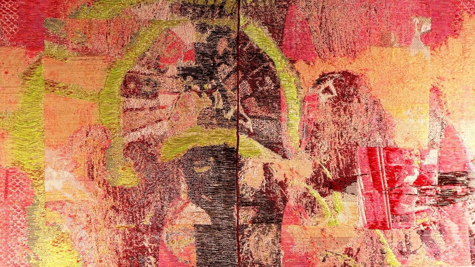 An ancient tapestry or textile artwork depicting a stylized scene with human figures, animals, and elaborate patterns, predominantly in shades of red, pink, and black.