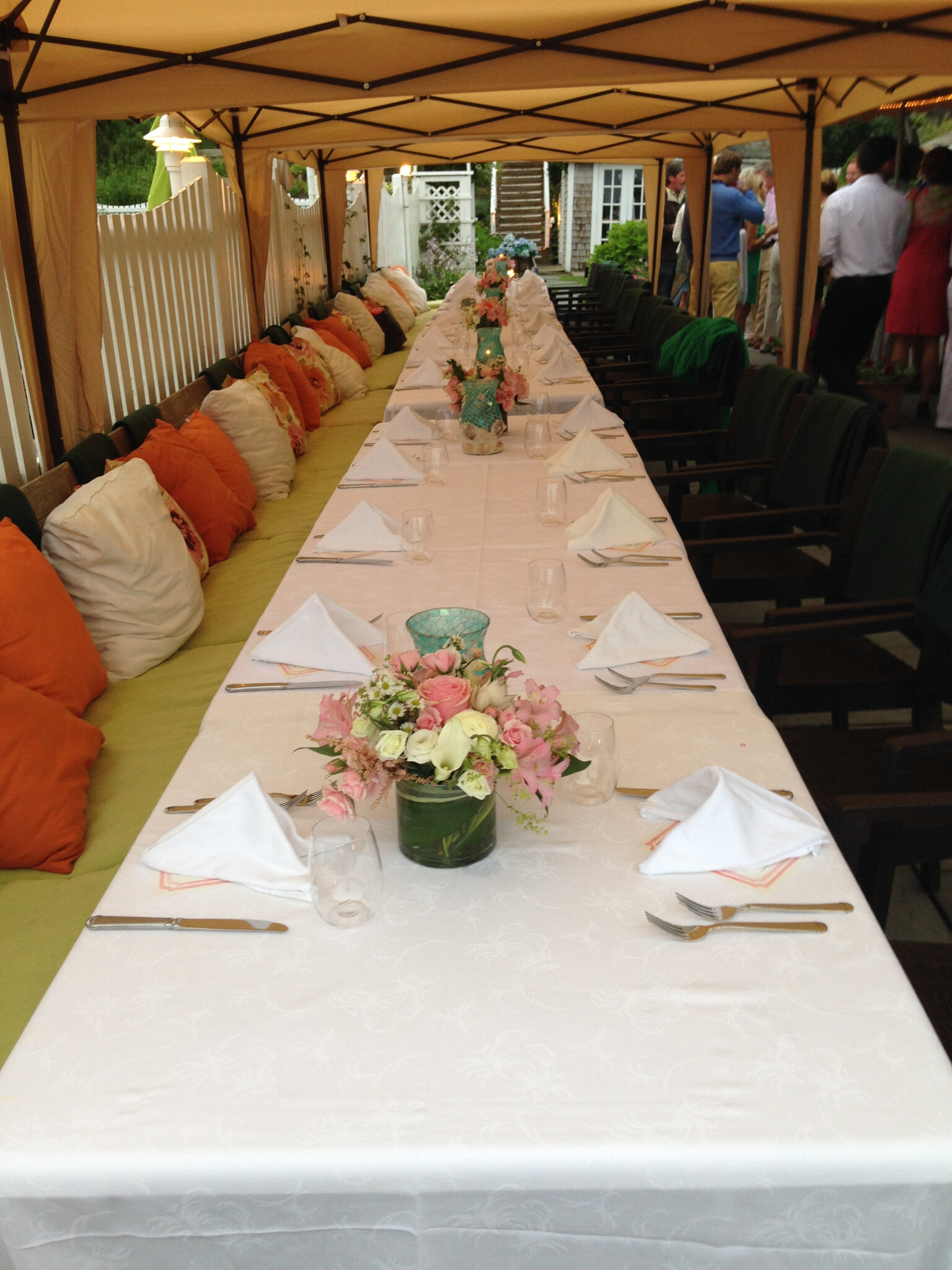 A long dining table setting for an event