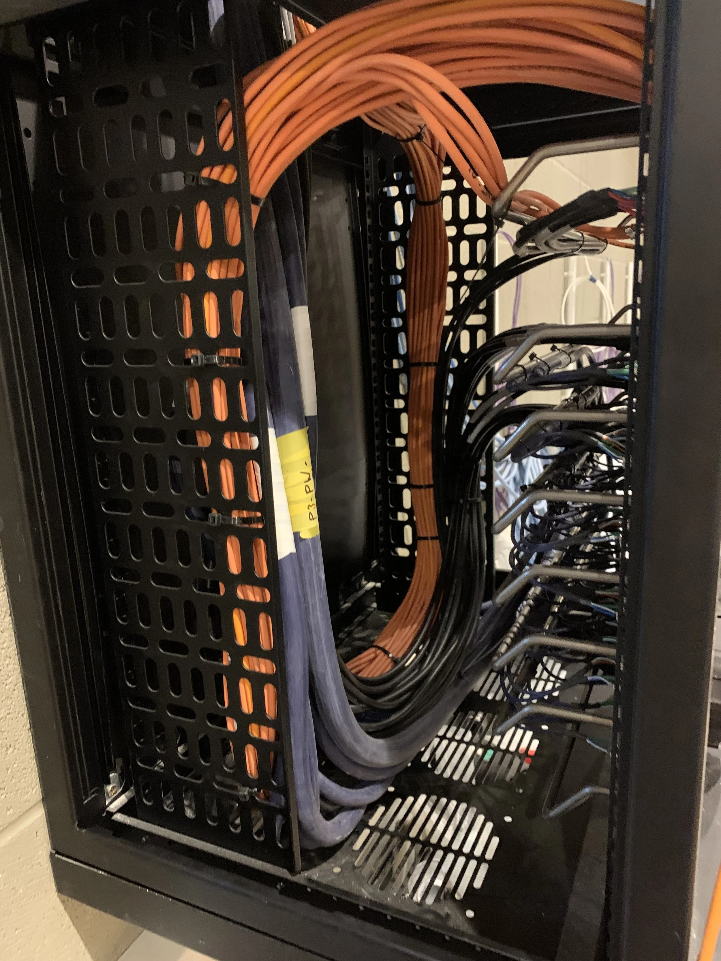 Room interconnects rack with data, audio, DMX cables and connectors.