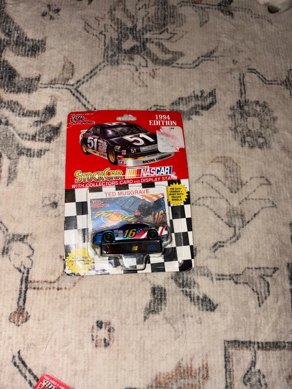 Racing Champions 1994 and 1993 NASCAR stock cars and stands — AMEN