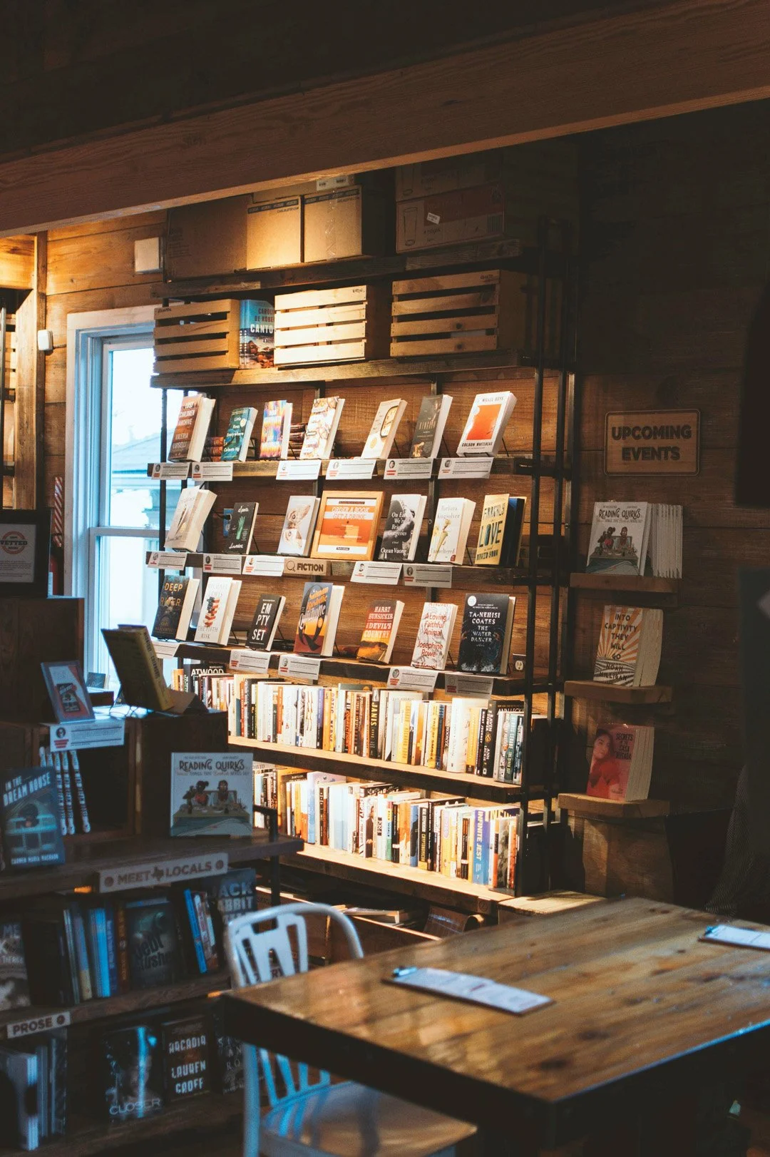 Bookstore shelves lined with books.