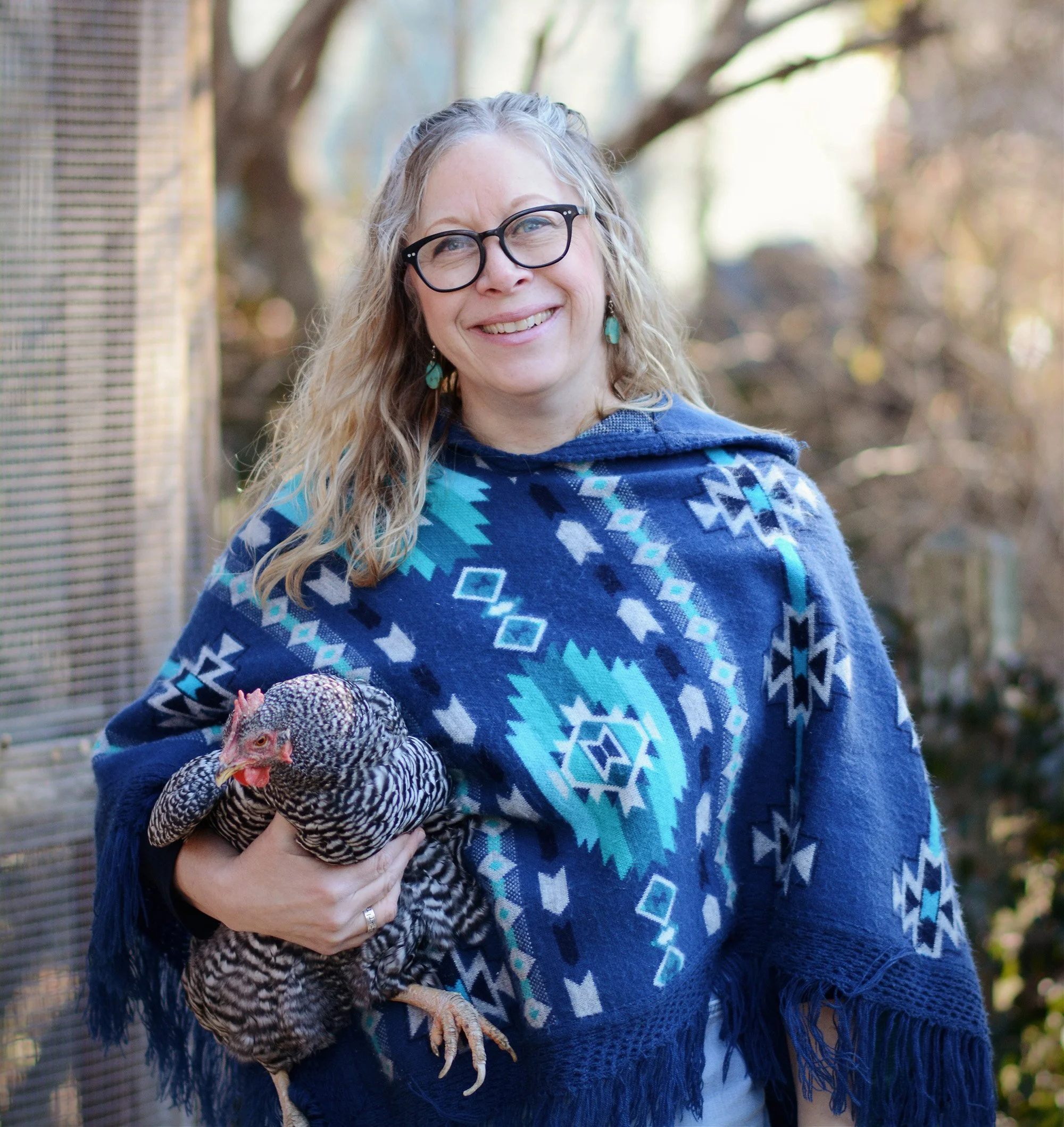 Author Julie Dieterich Pappas holding a chicken