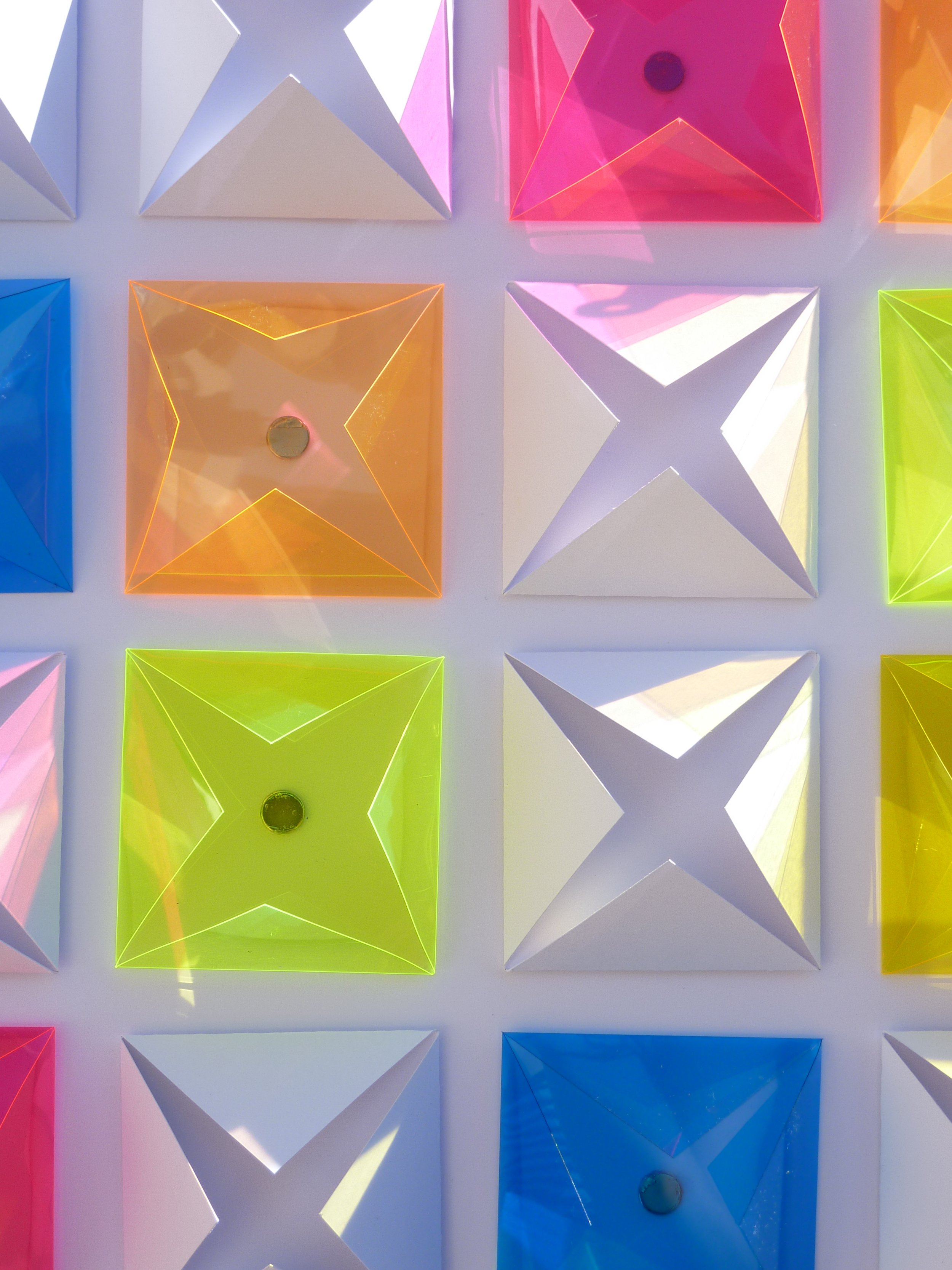 Paper and Coloured Plastic Manipulation with Magnets