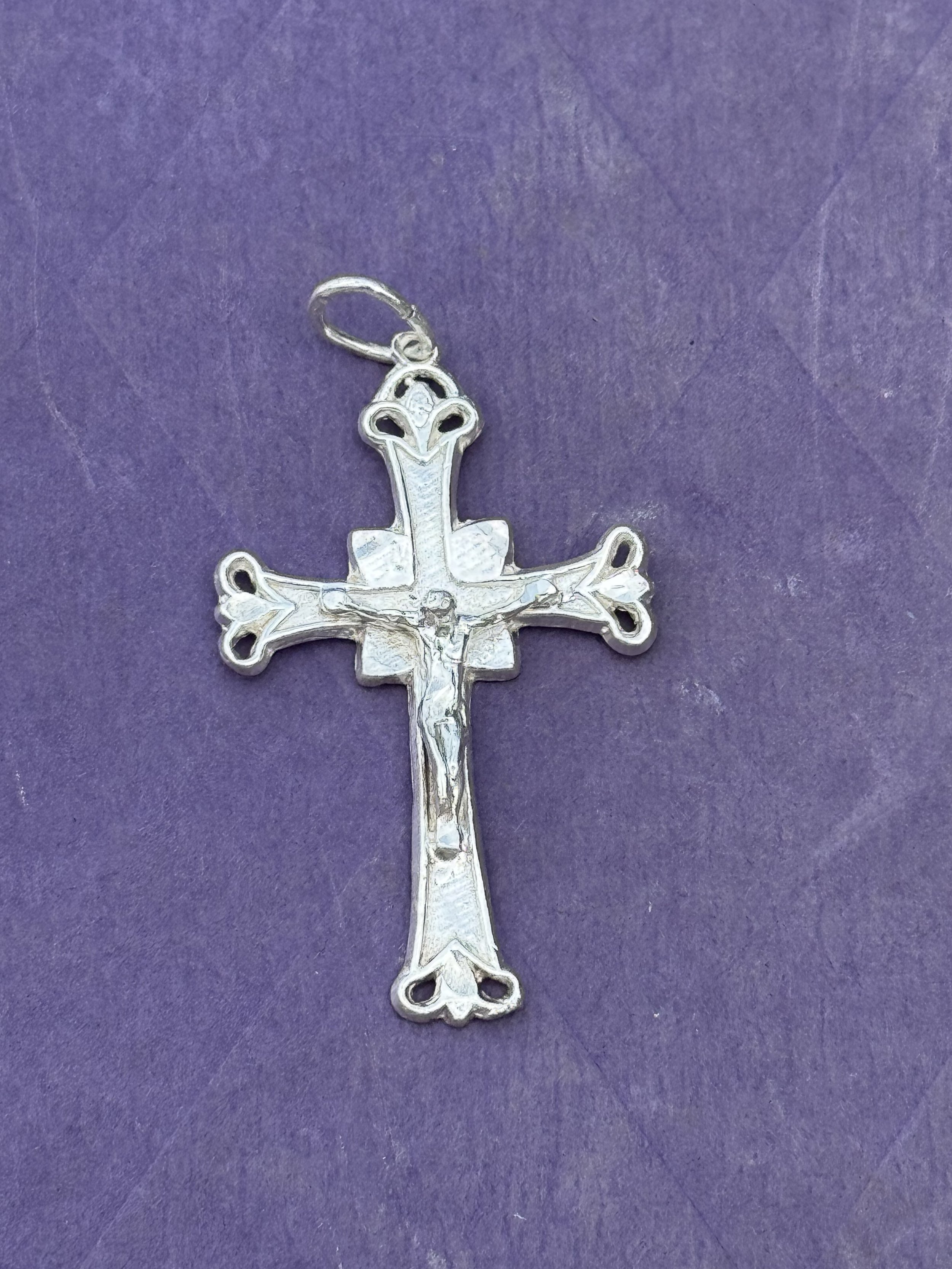 Silver tone cross