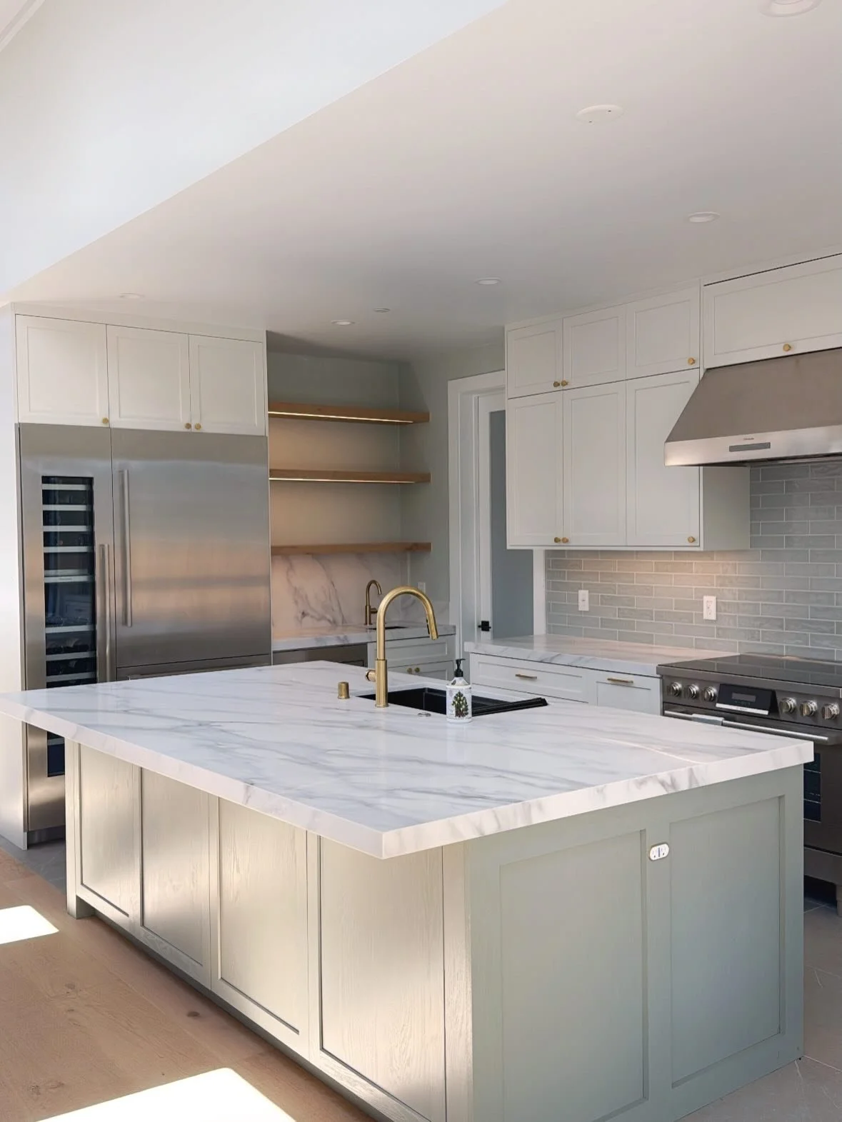 This project is starting to come together.

What began as a soft palette of muted greens, warm brass, layered whites, is slowly taking shape across the home.

Nothing here is meant to stand out on its own.
The intention was always for the spaces to f