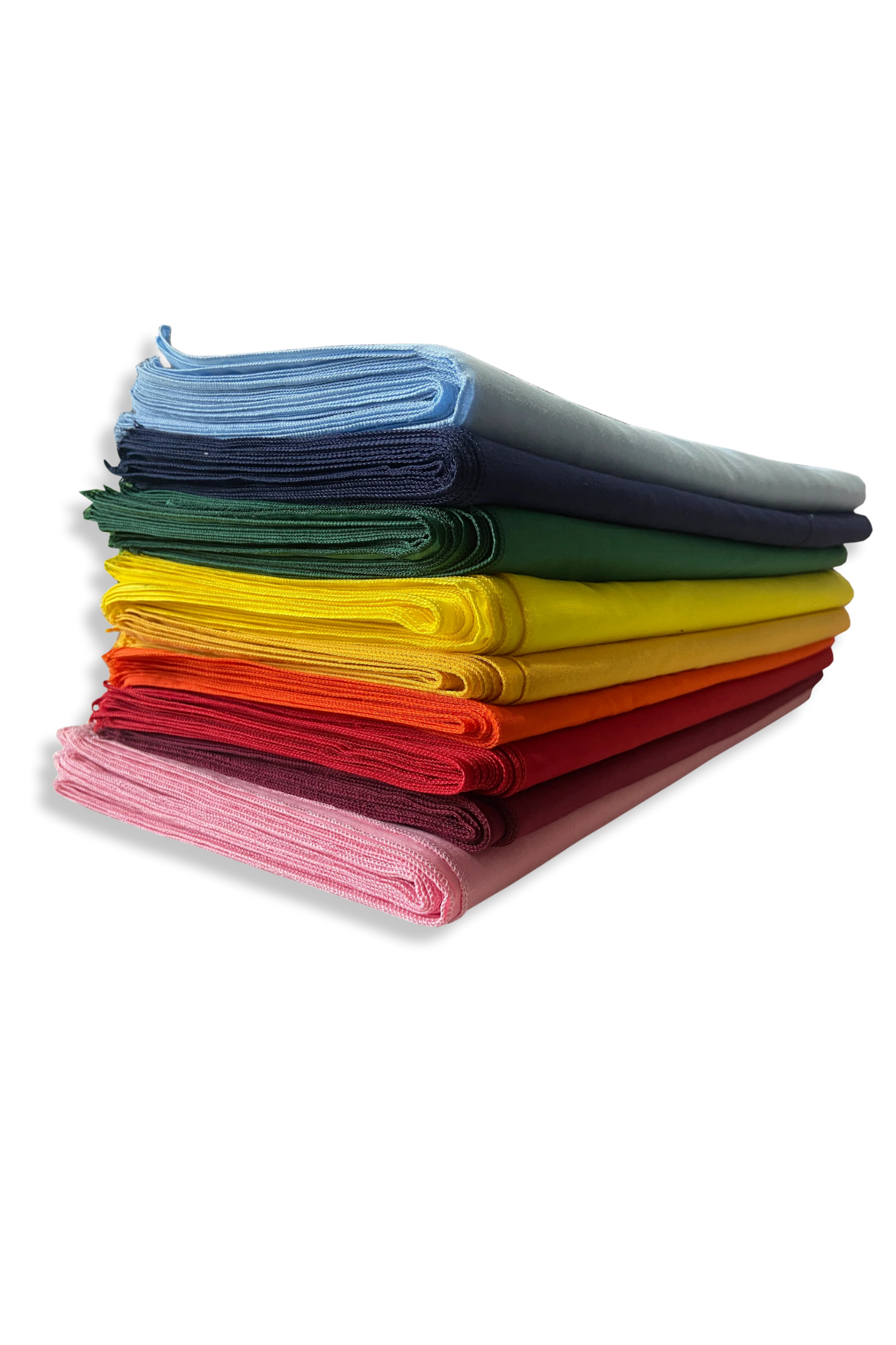 Stack of folded colorful sports bras arranged in rainbow colors from pink at the bottom to blue at the top on a black background.