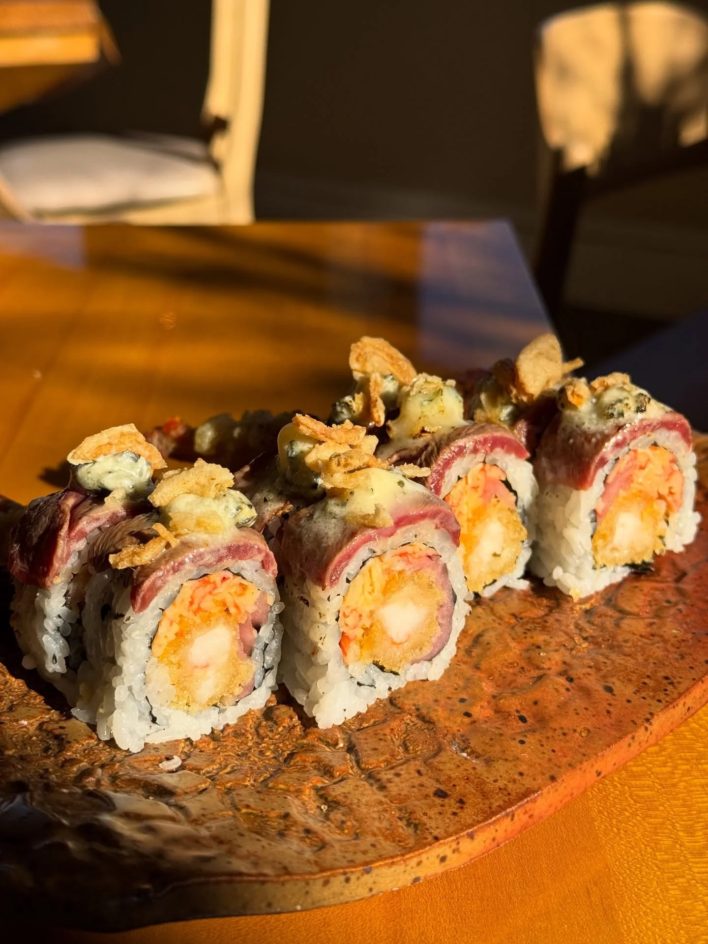 Delmonico Roll - American Wagyu, blue cheese, fried onions; shrimp tempura, spicy crab salad &amp; pickled onions