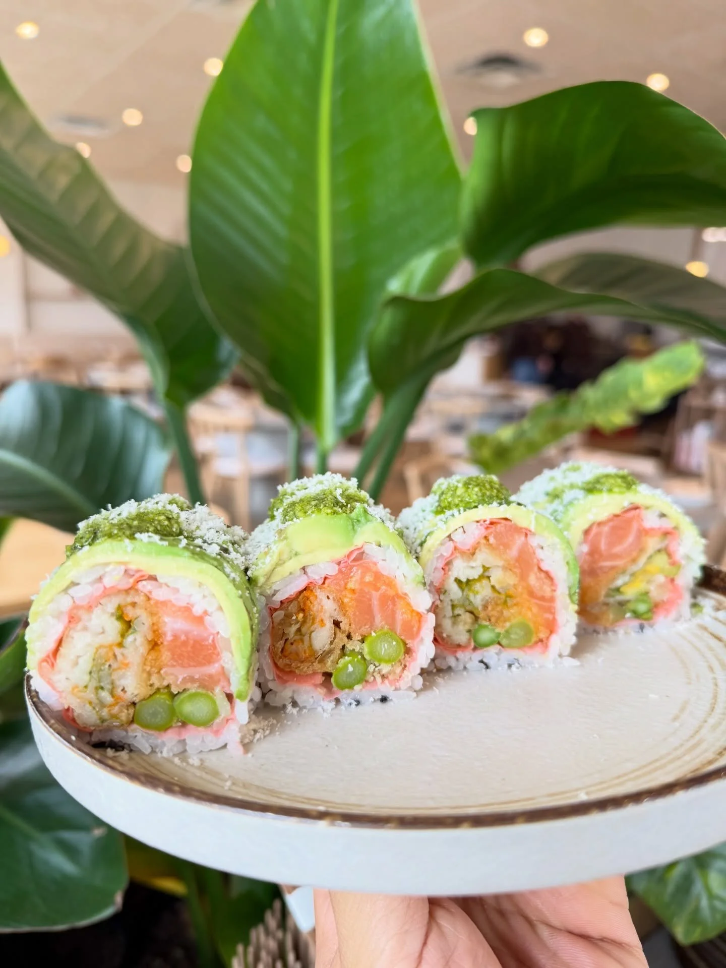 Salmon Fiori Roll - salmon, crispy ricotta filled zucchini blossom, asparagus; Avocado, basil pesto and Parmesan