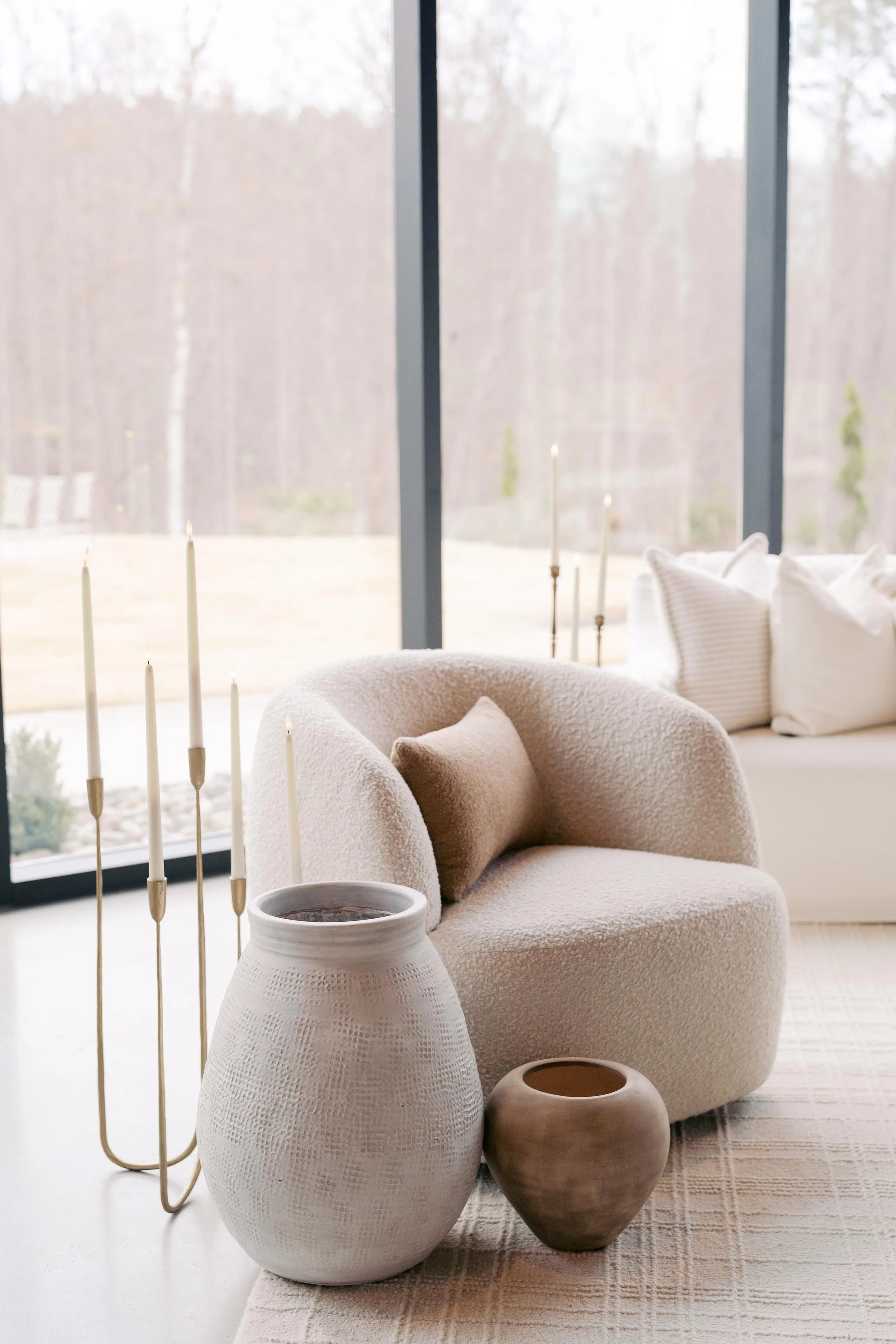 lounge chair with vases and a candelabra