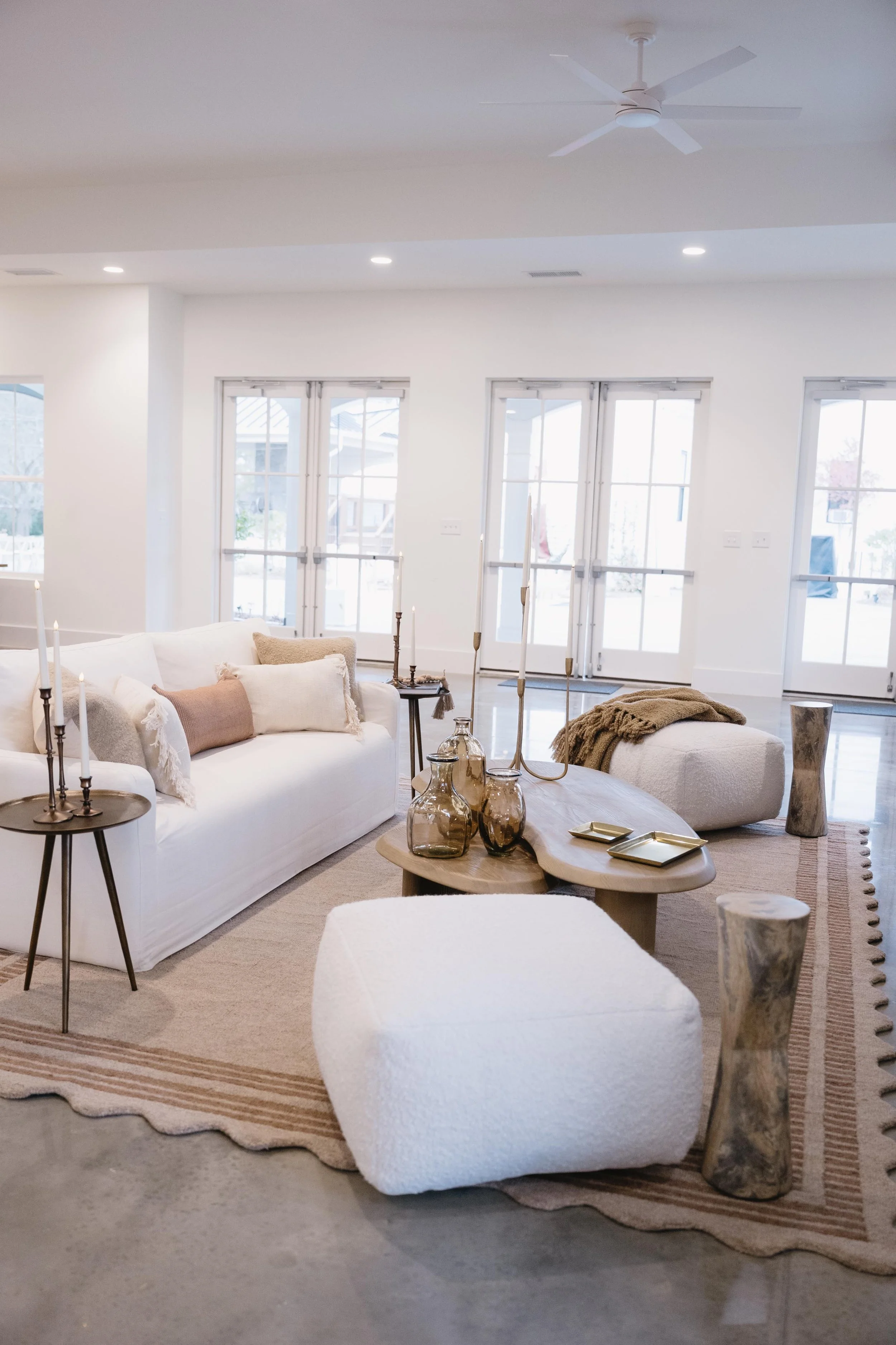 lounge set up with warm accents and soft furniture