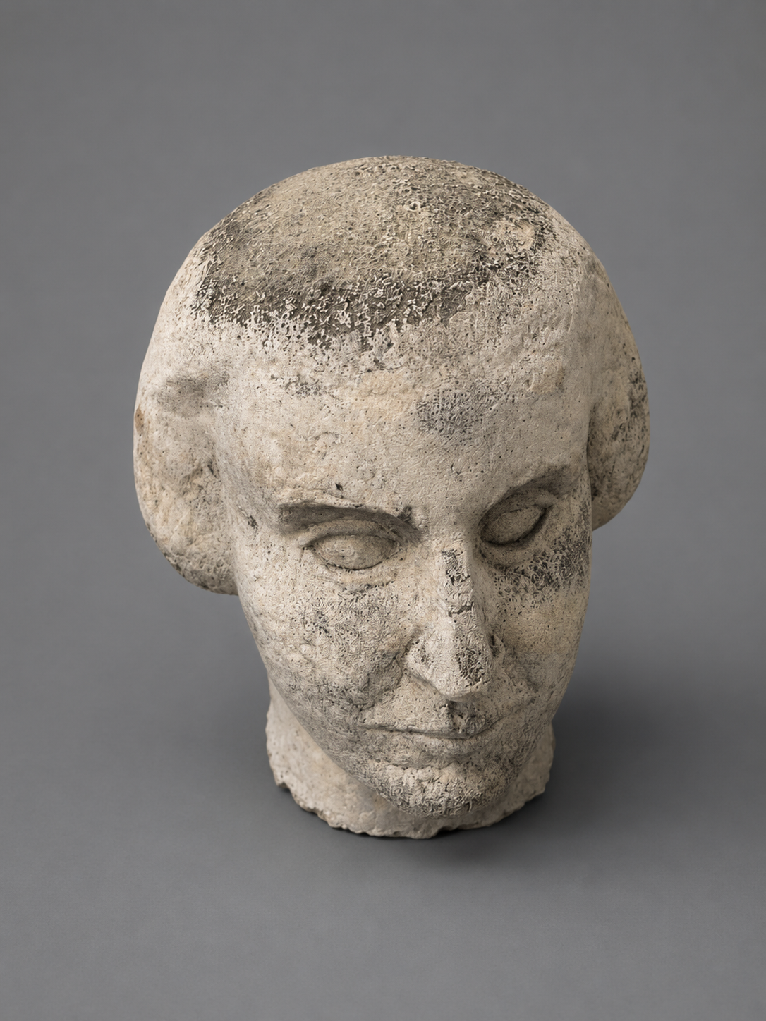 SCULPTURE OF A WOMAN HEAD