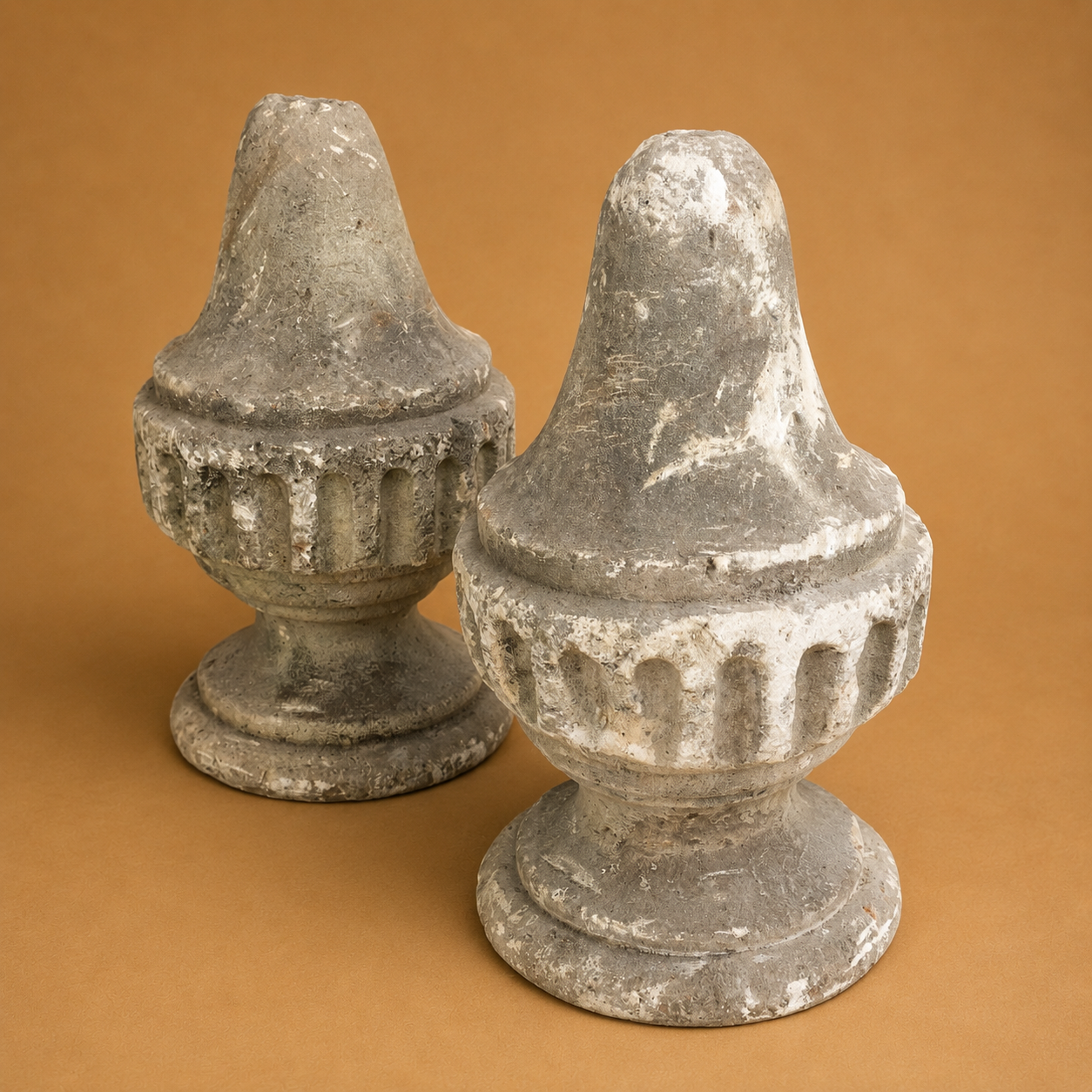 PAIR OF CARVED GARDEN STONE FINIALS