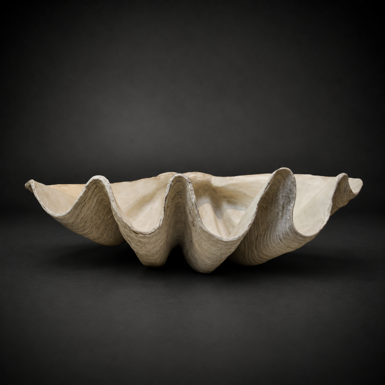 mlt017-inner-gardens-wall-table-clam-shell-limestone.jpg
