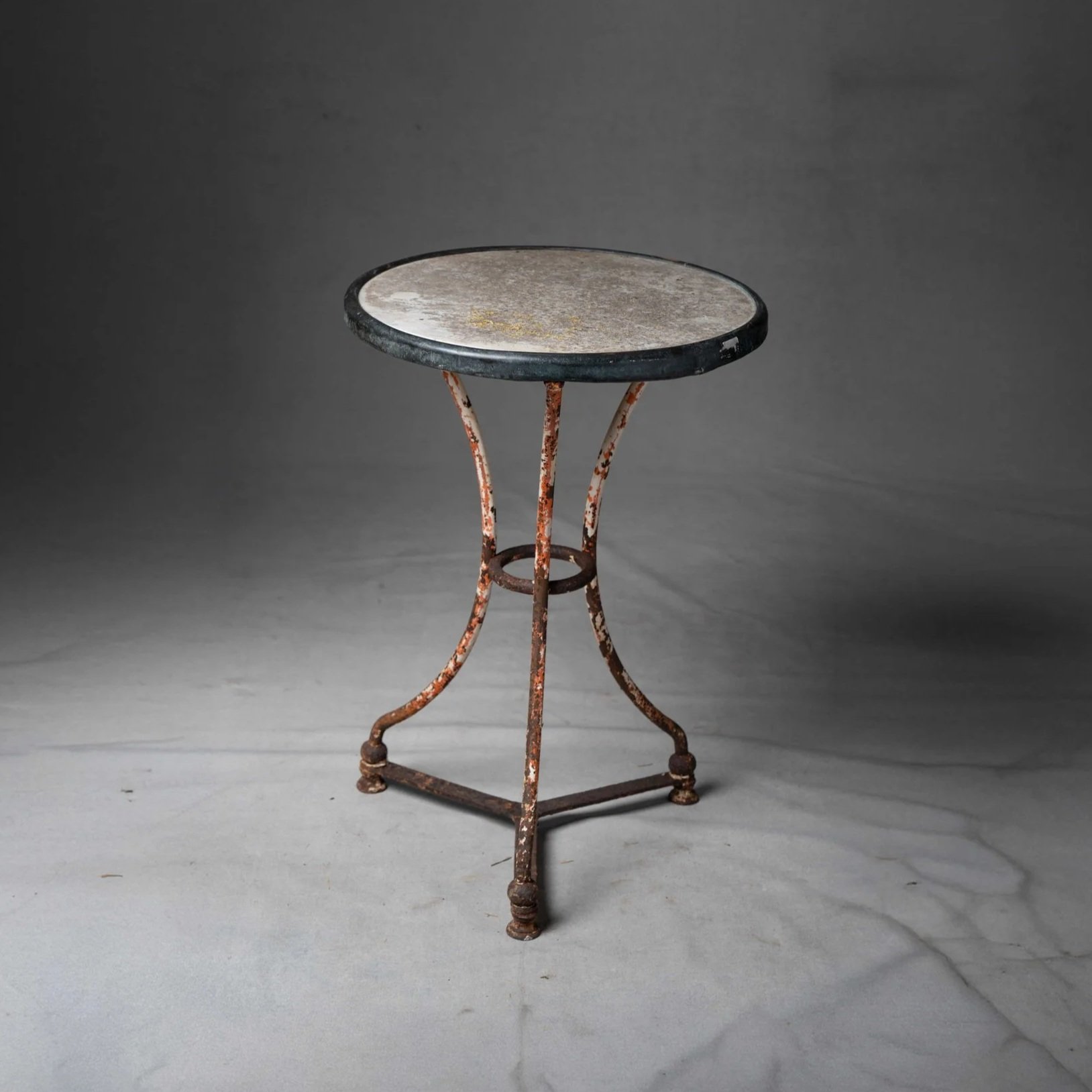 WROUGHT IRON BASE MARBLE TOP TABLE