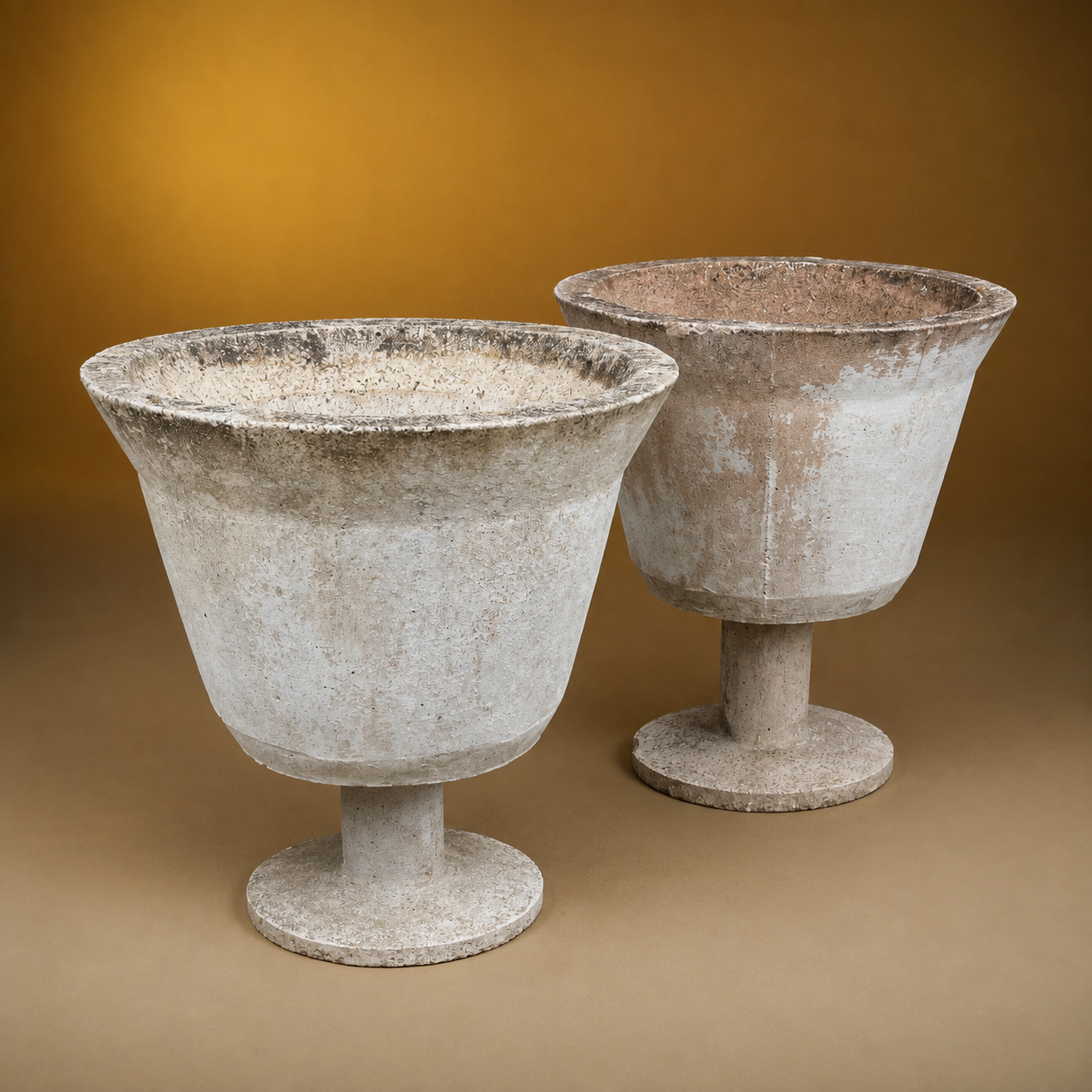 PAIR OF FRENCH MID CENTURY CAST CONCRETE VASES ON PEDESTALS