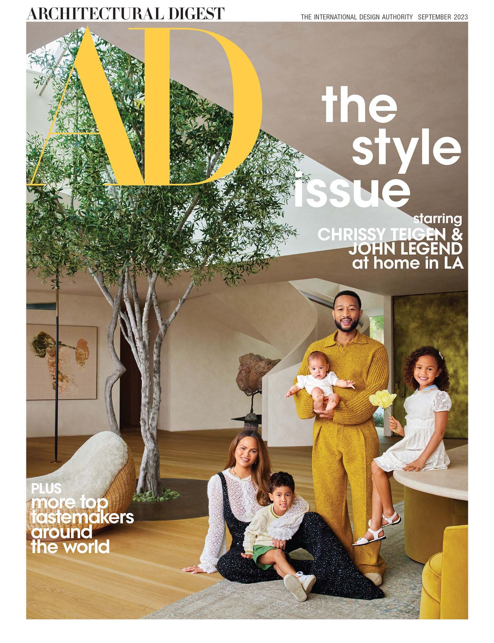 Cover of Architectural Digest magazine, September 2023 issue, featuring a family of four with diverse skin tones in a modern, stylish home interior with a large green tree and contemporary decor.