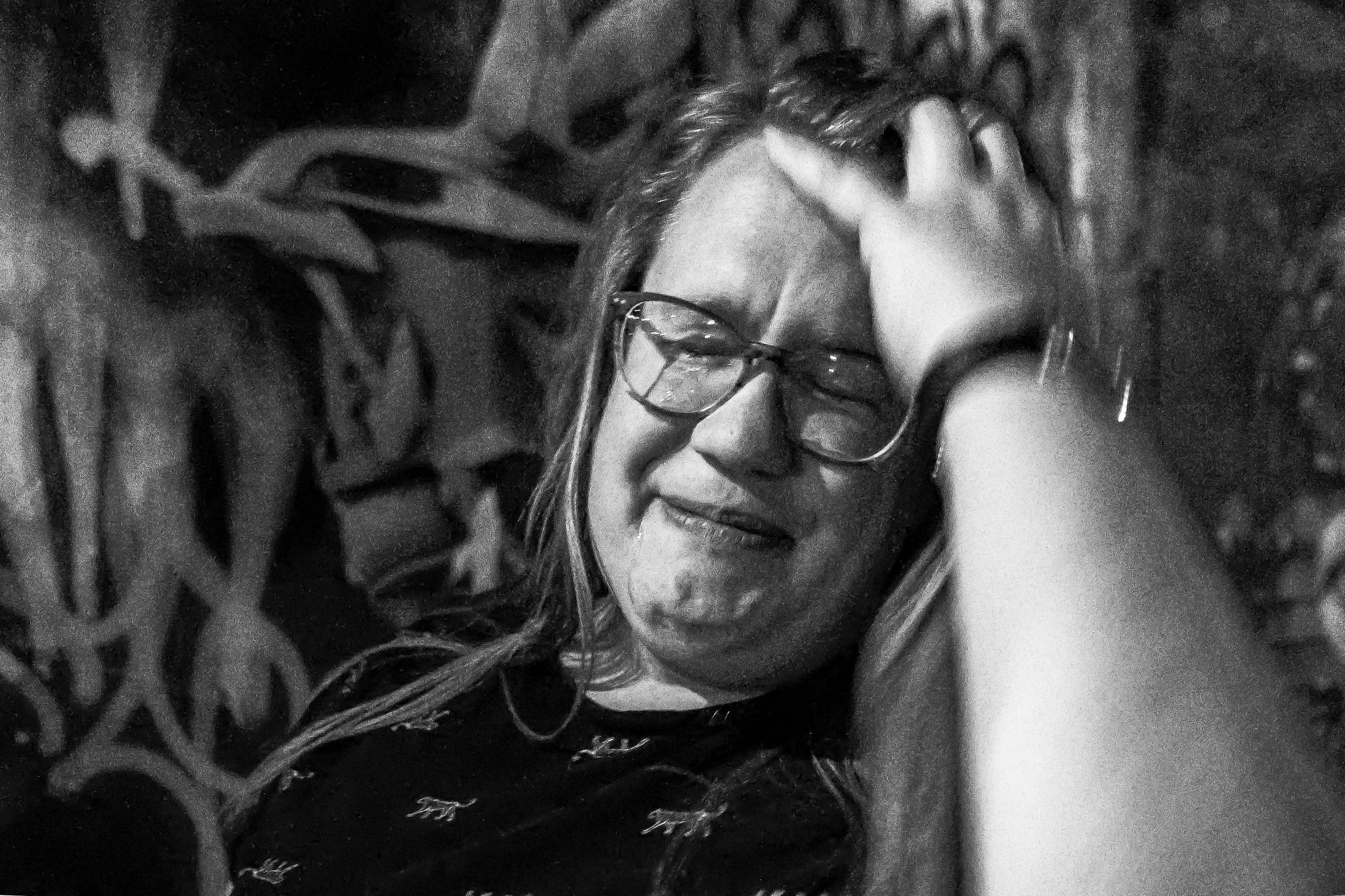 Editorial documentary real life real emotion candid photo portrait of woman in city black and white Denver
