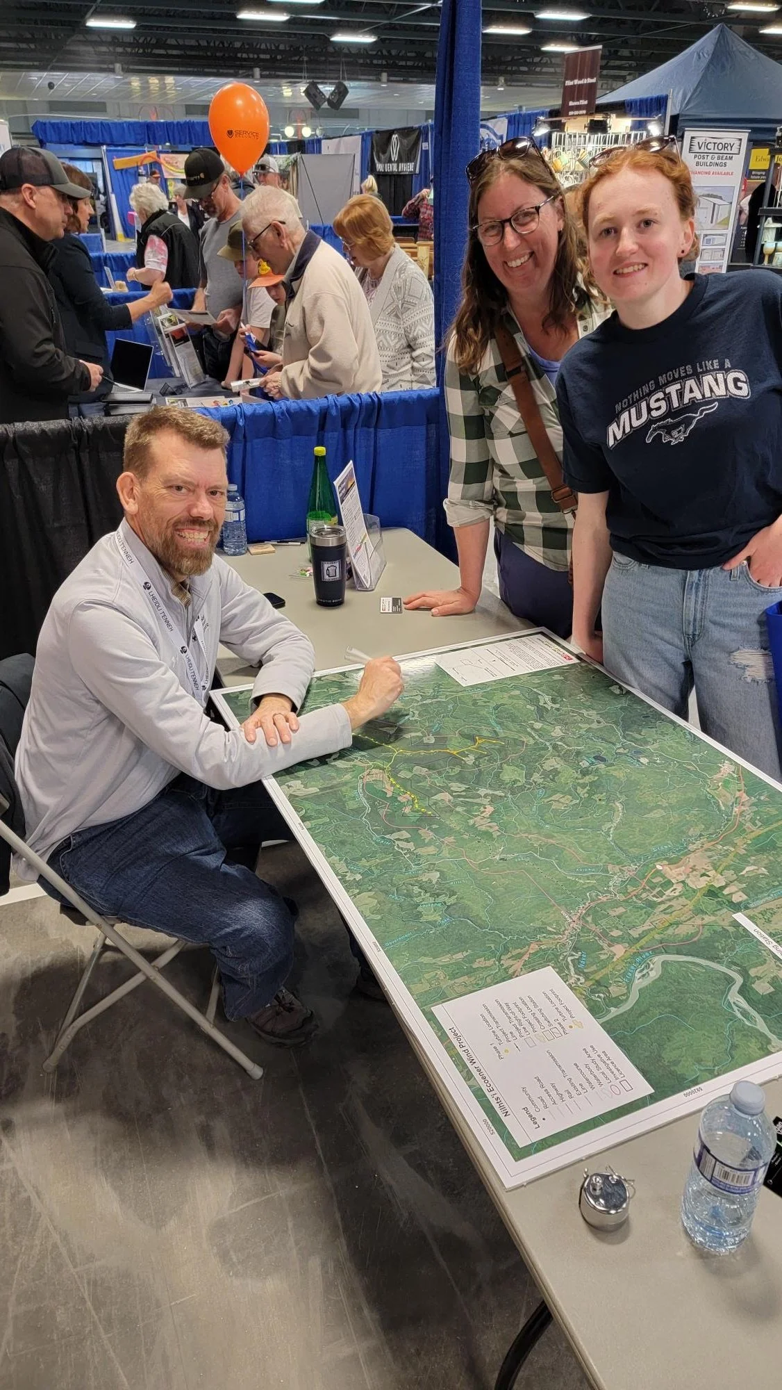Dan engaging community members at the Quesnel Trade Show