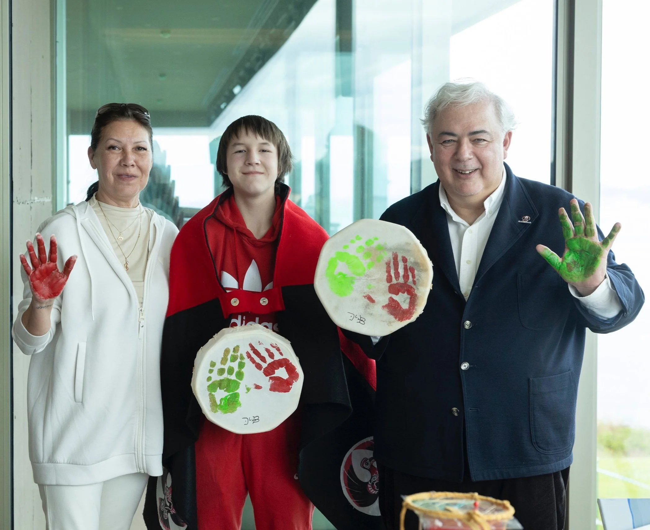 This is an image of Lheidli T'enneh First Nation Chief Dolleen Logan, LTFN Member Aubrey Seymour, and Chairman of Ecoener Luis de Valdivia.