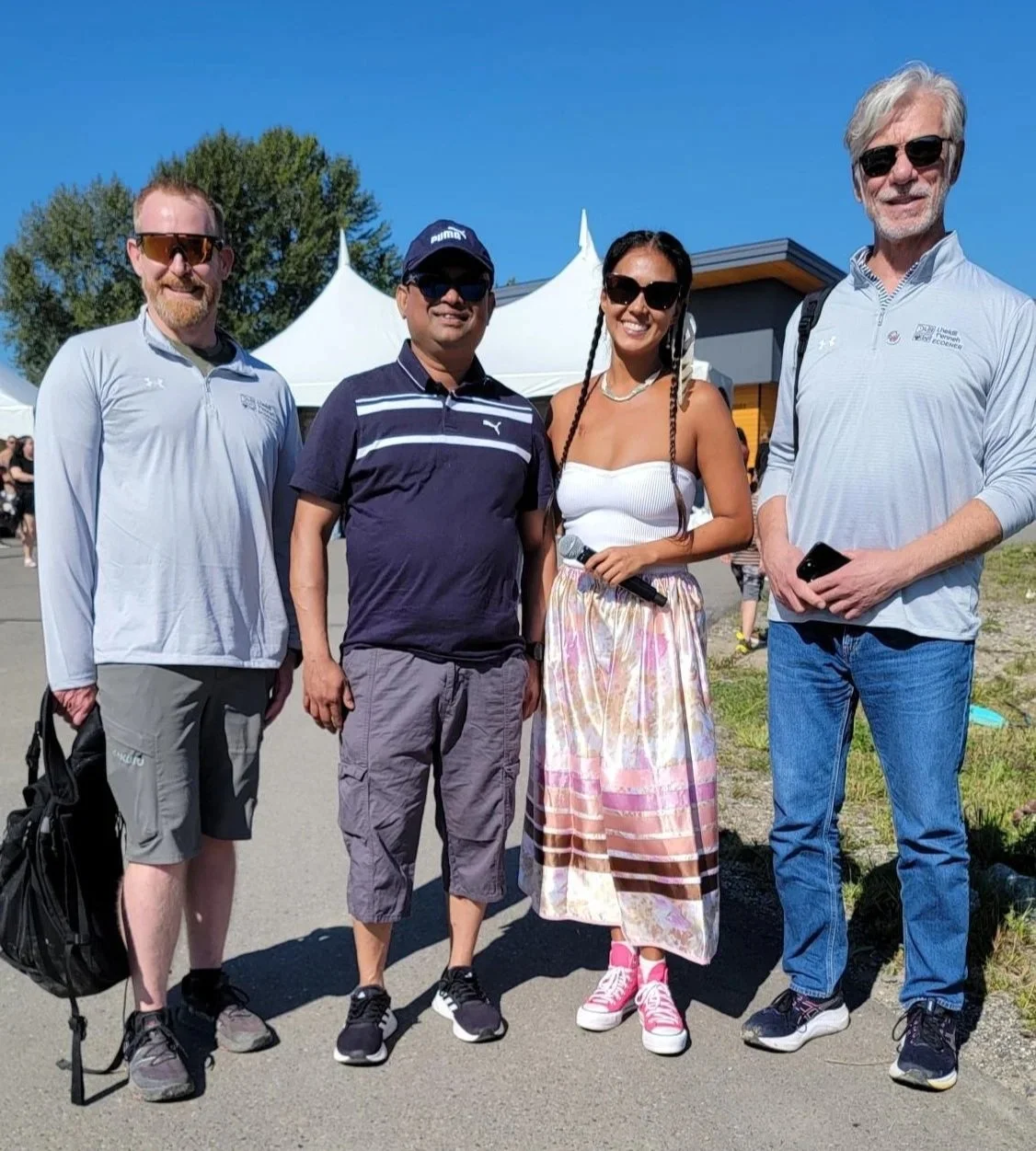And image from the Lheidli T'enneh First Nation AGM fromL to R: Matt Colden, Project Director, Towfiq Islam, LTFN Executive Director, Keilani Rose, AGM CO-MC, Mike Chapin, Ecoener Advisor
