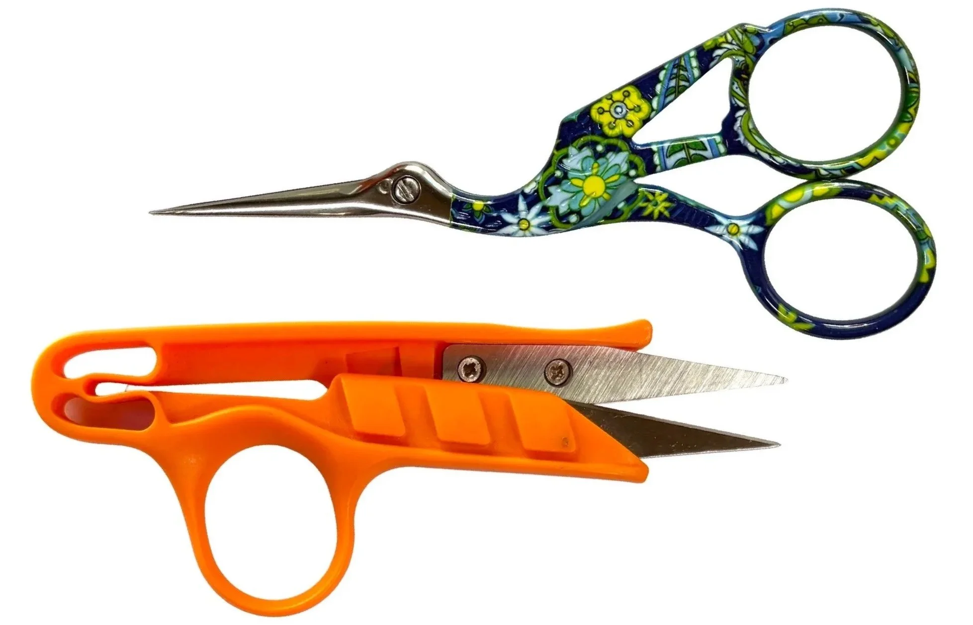 Pair of scissors with a colorful floral pattern and an orange utility knife.
