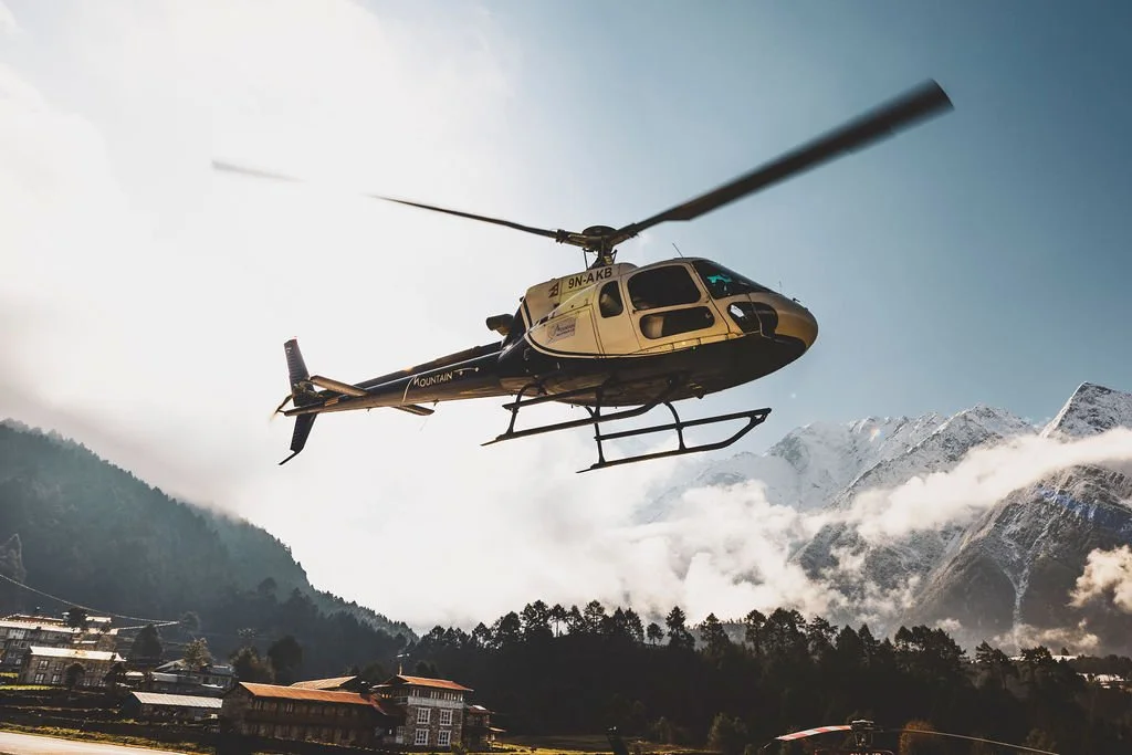 High Altitude helicopter descent from Climbing the Seven Summits' Everest Base Camp for Rugged Luxury guests