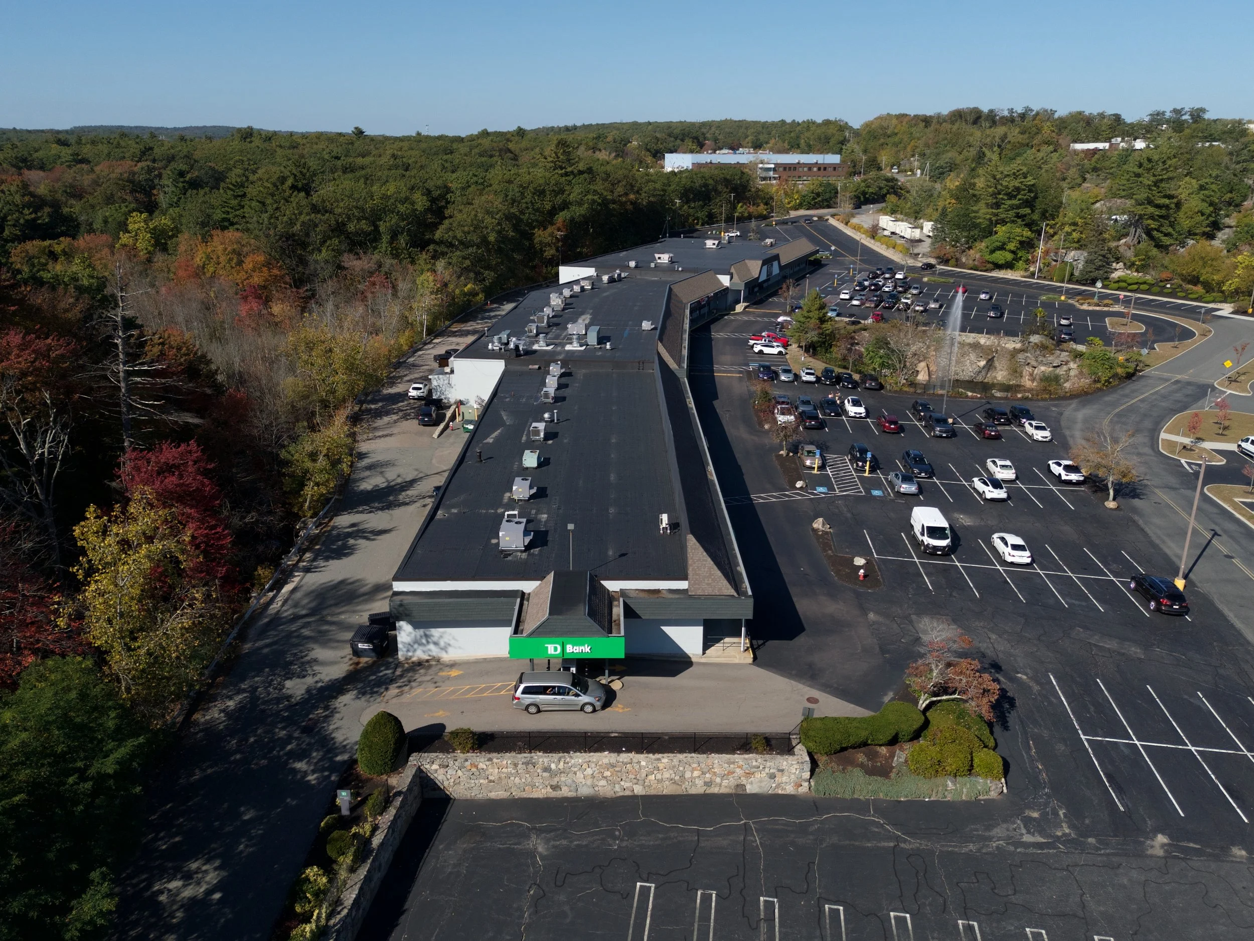 Aerial photo of a plaza in Milford, Massachusetts for marketing and real estate purposes.