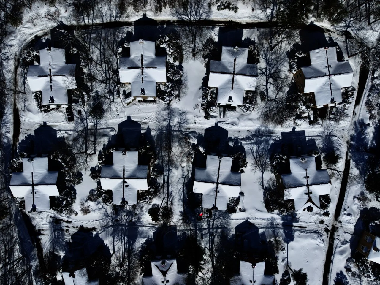 Drone, aerial photography of a recent snowfall in New England, Massachusetts, blizzard 2026, blue sky, snow
