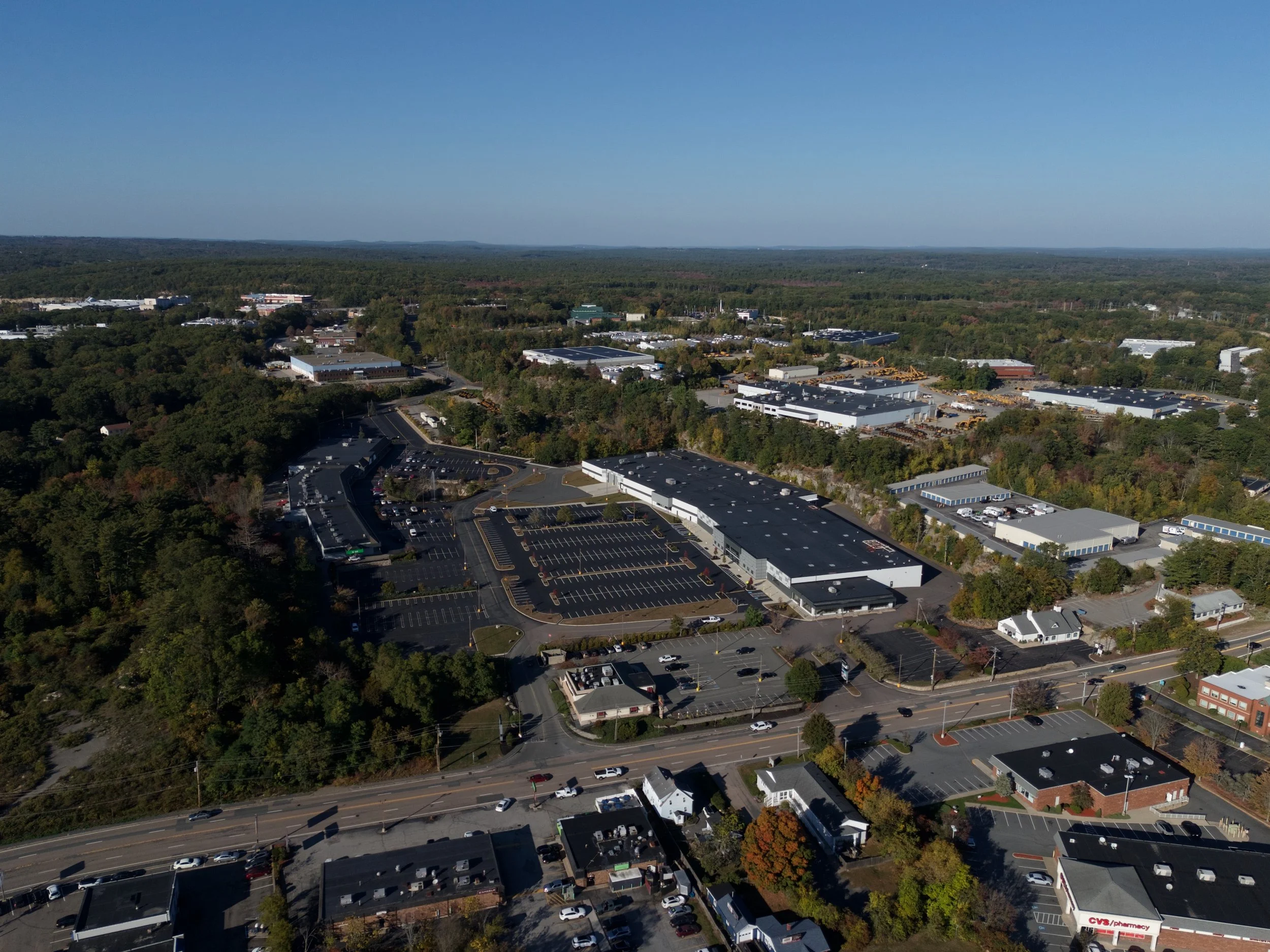 Aerial photo of a plaza in Milford, Massachusetts for marketing and real estate.