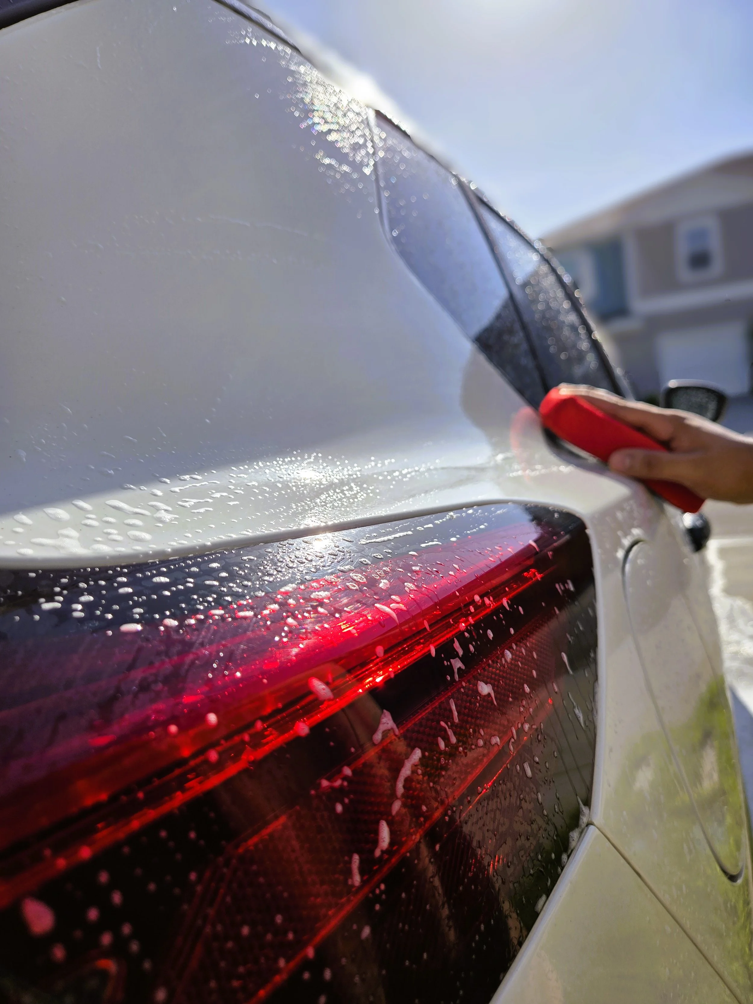 Hand and side of car_editted (1).jpg