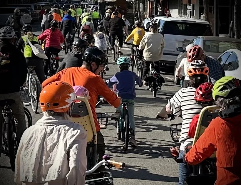 Walk and Roll Day on Mtn View 2022 - riders and signs