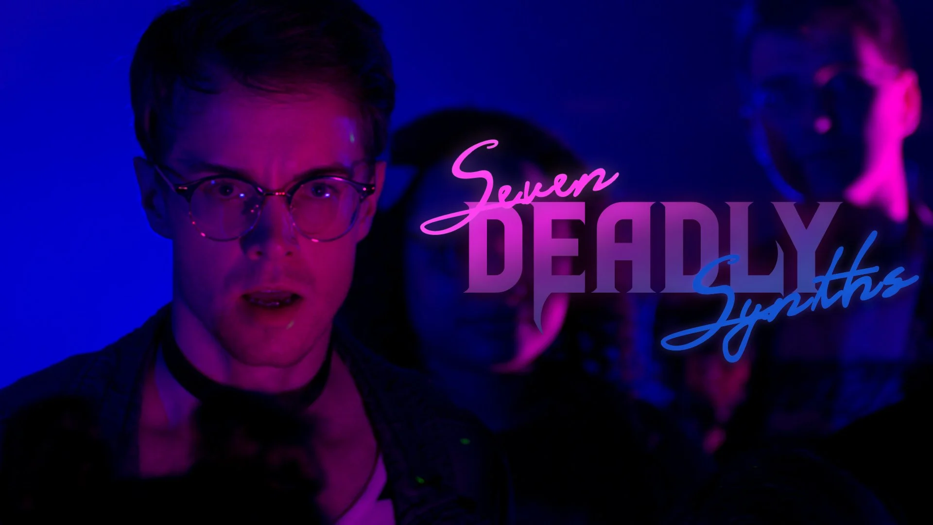 A neon-lit scene with three people in the background, two more visible with glasses, with the text "Seven Deadly Youths" in pink and blue neon script. The lighting is vibrant with purple and blue hues.