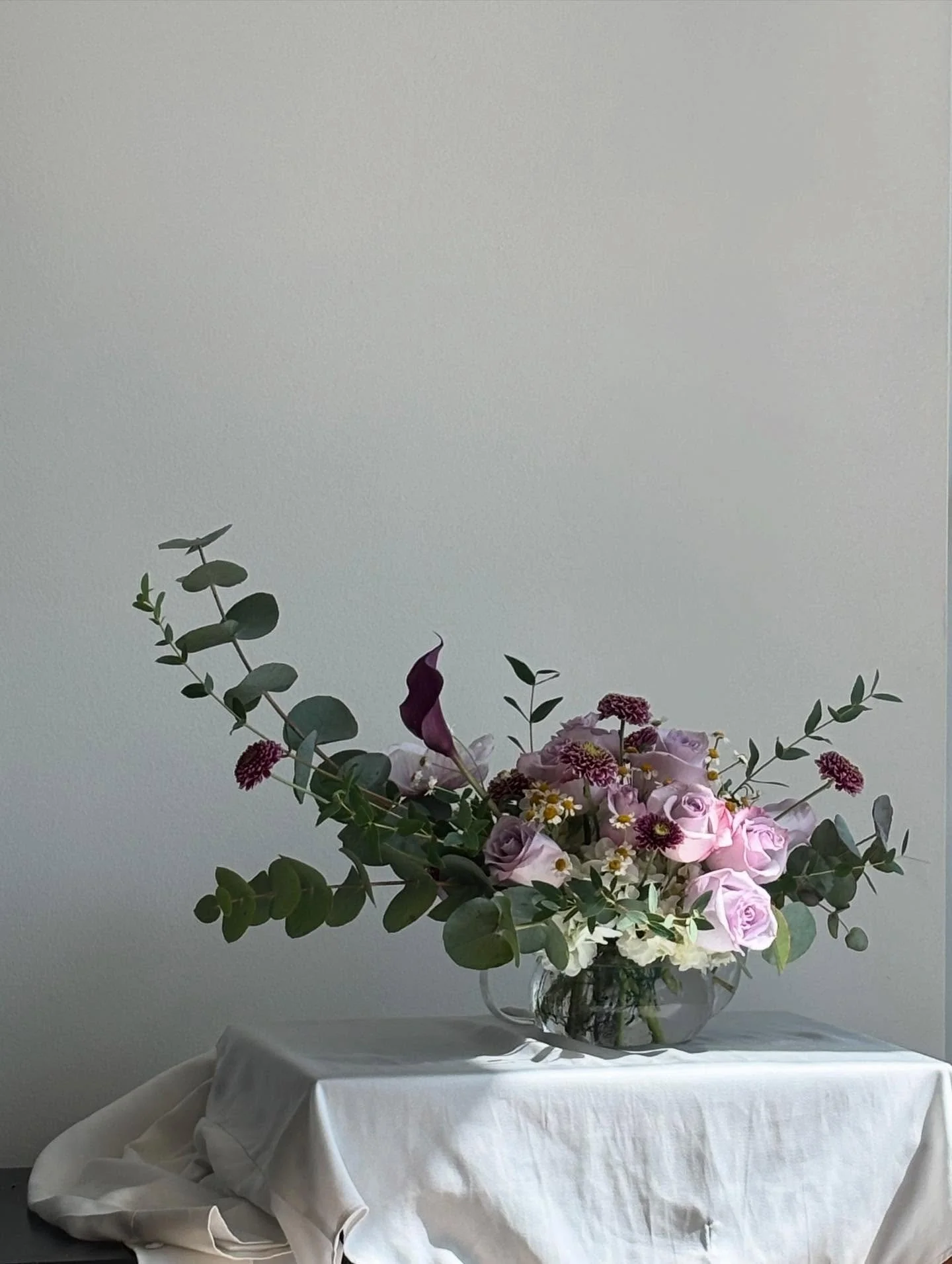 blooms in a glass teapot - can you think of a more perfect housewarming gift?