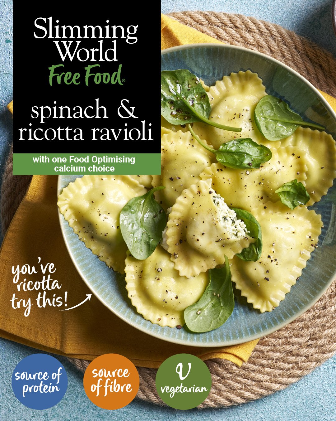 A plate of spinach and ricotta ravioli garnished with fresh basil leaves, black pepper, and grated cheese, with a label indicating it is vegetarian and a source of protein and fiber.