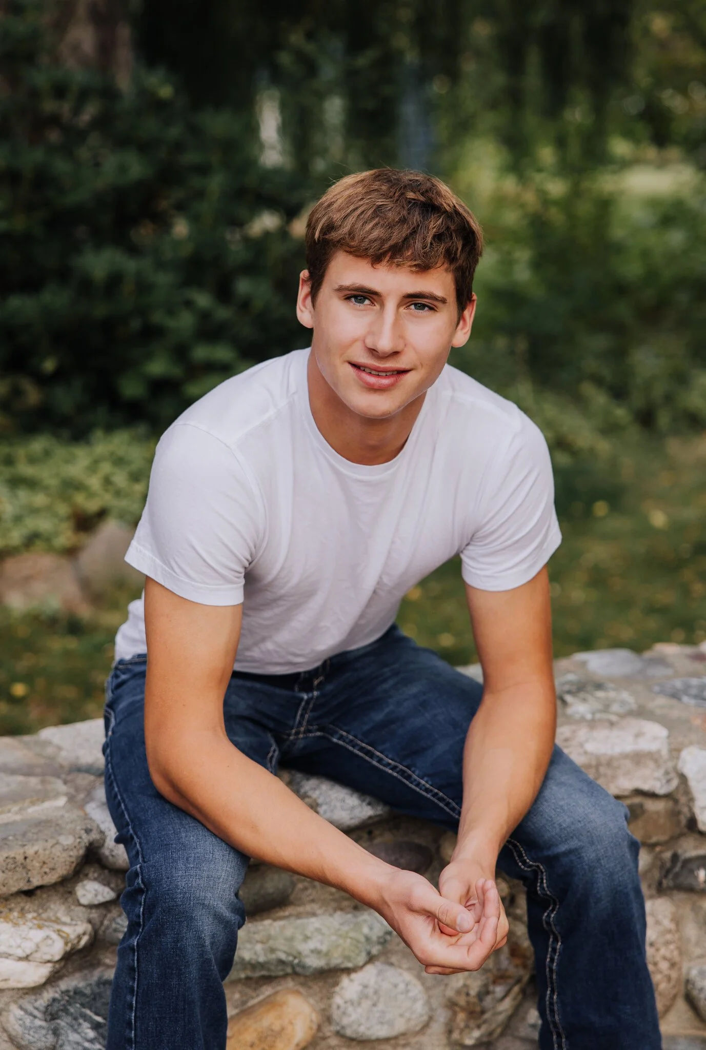 lake-chelan-senior-photographer-stone-wall-sit-portrait-02.jpg