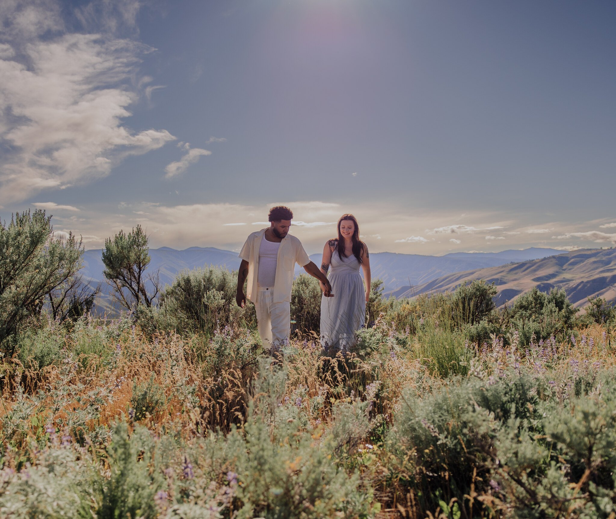 lake-chelan-engagement-photographer-sunlit-walk-sagebrush-17.jpg