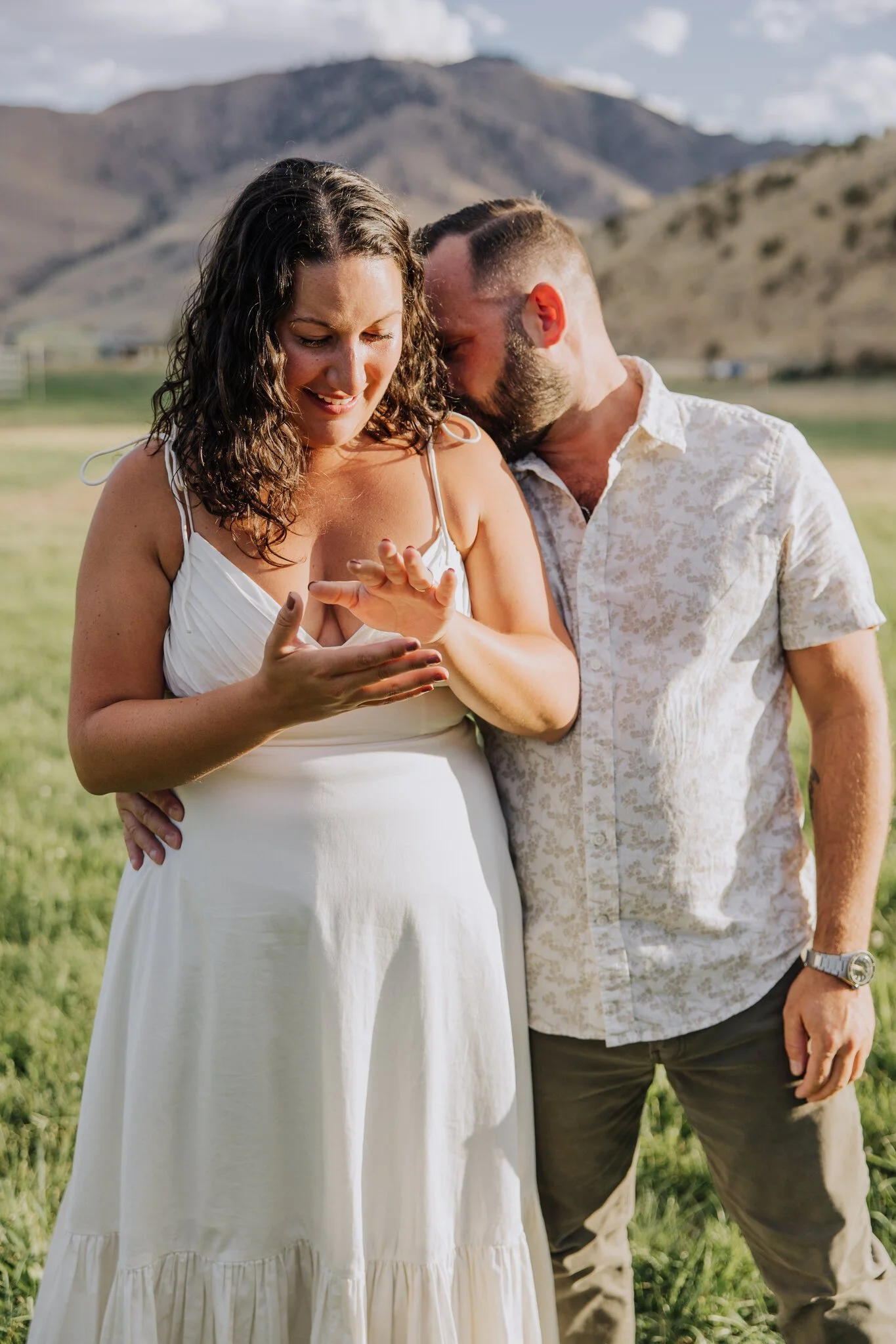 lake-chelan-proposal-photographer-looking-at-ring-29.jpg