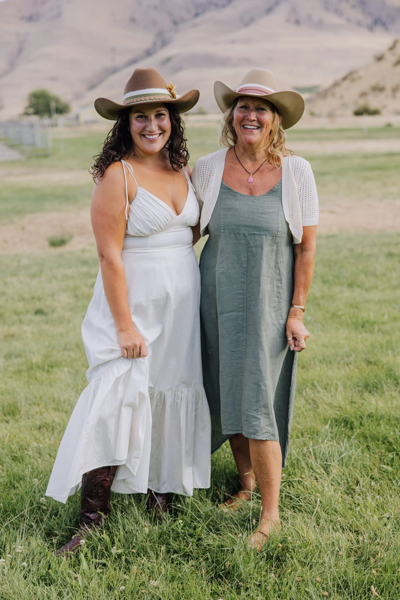 lake-chelan-proposal-photographer-mother-daughter-laughing-hats-36.jpg