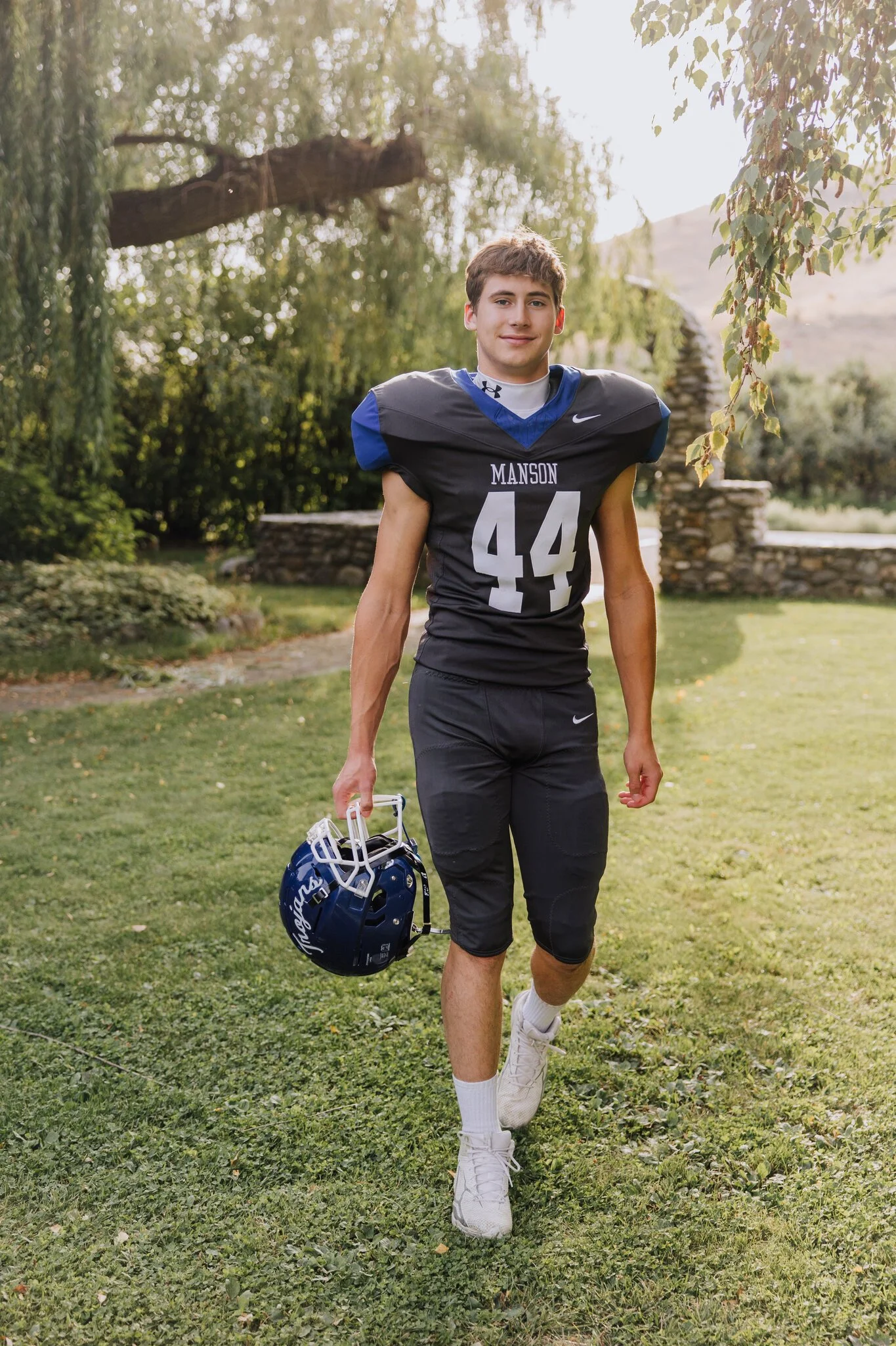 lake-chelan-senior-photographer-football-uniform-walk-candid-30.jpg