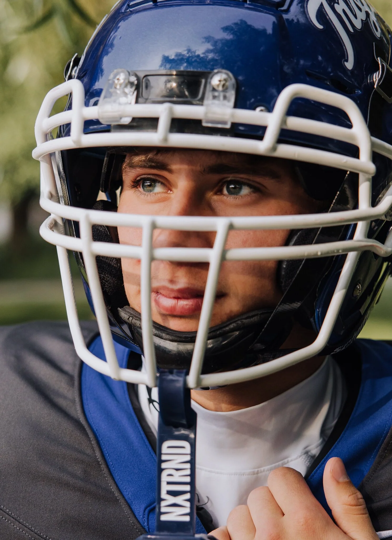 lake-chelan-senior-photographer-football-helmet-close-up-intense-33.jpg