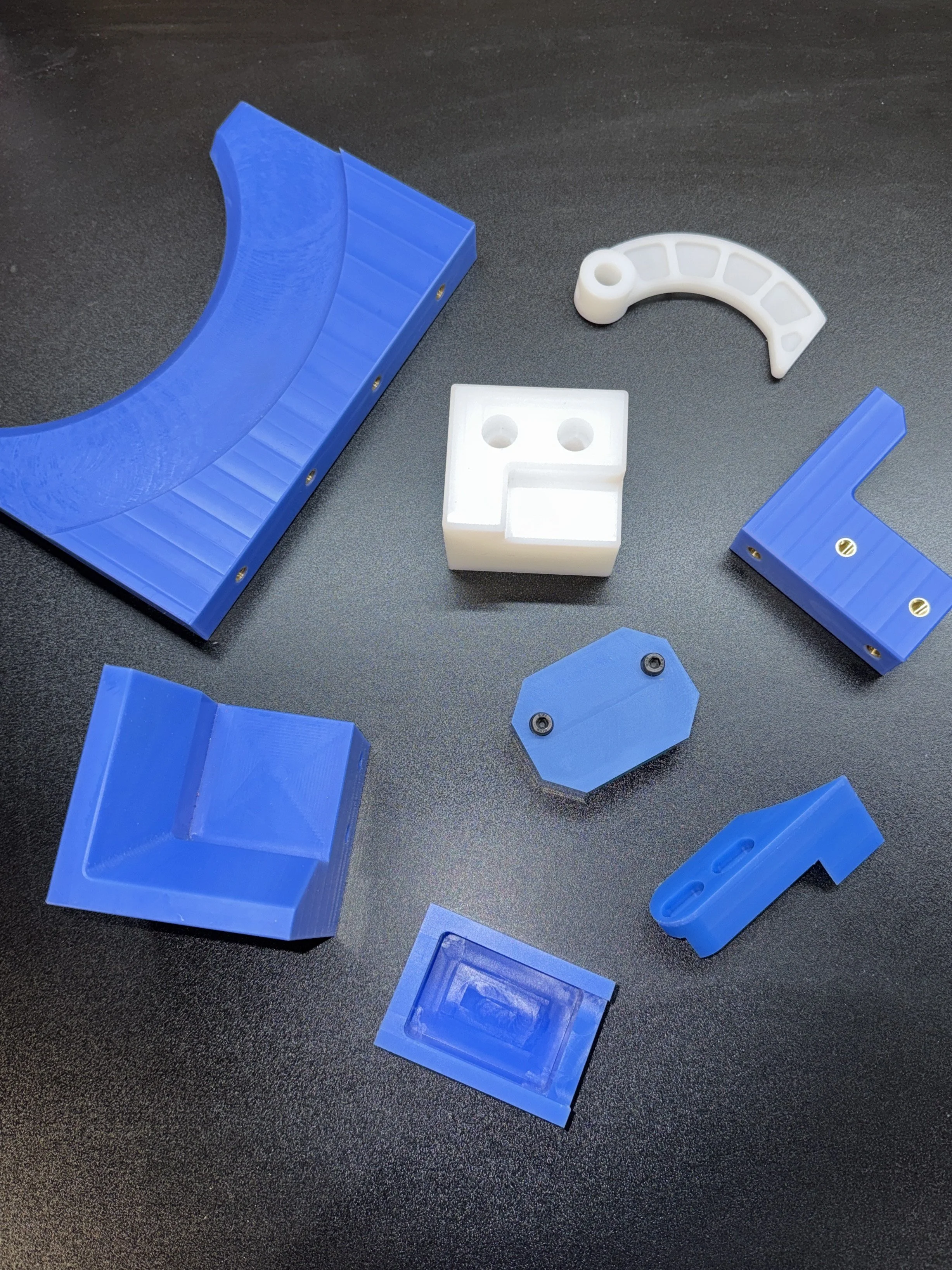 Variety of CNC machined engineered plastic components.jpeg