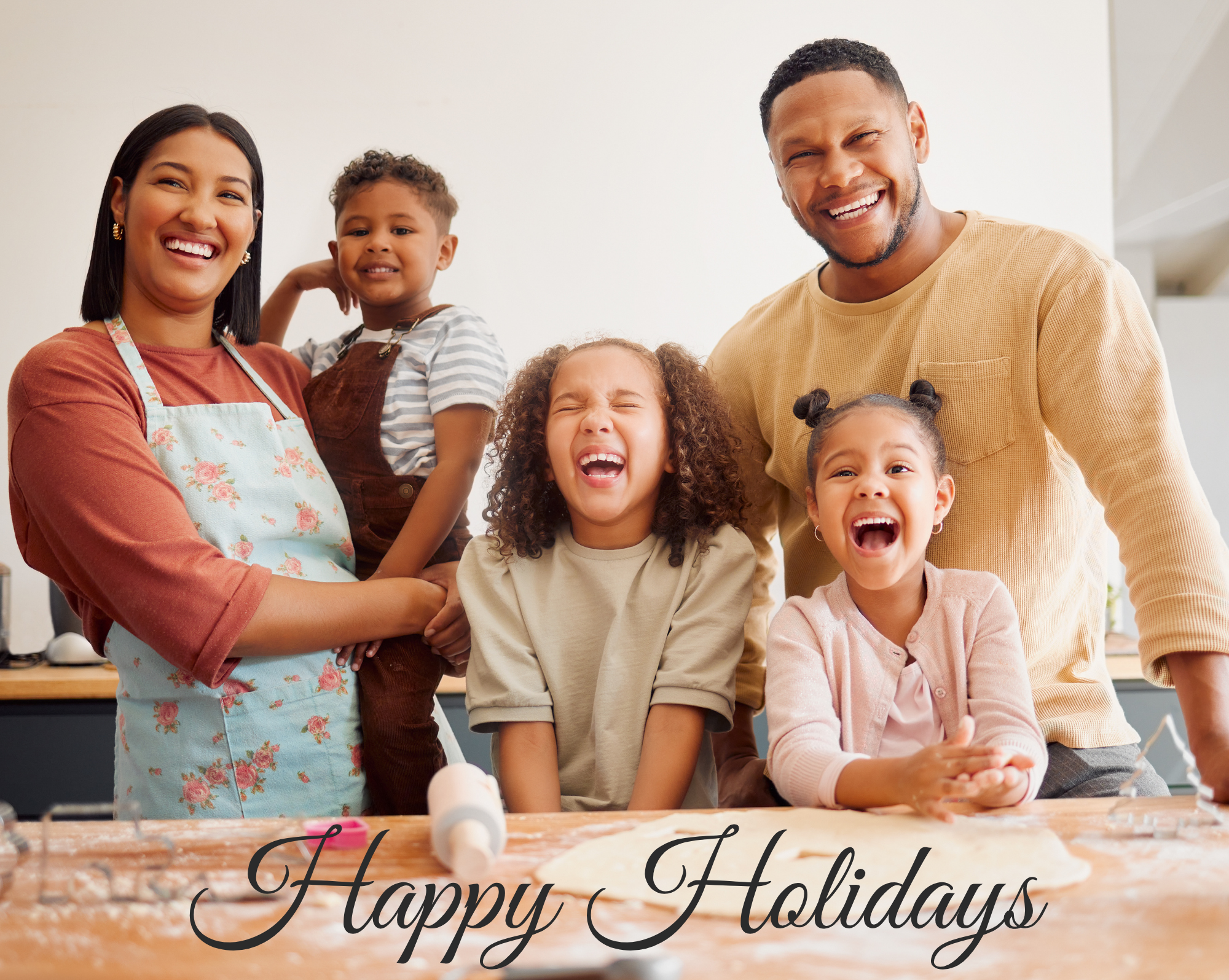 Photo of family with Happy Holidays on the photo