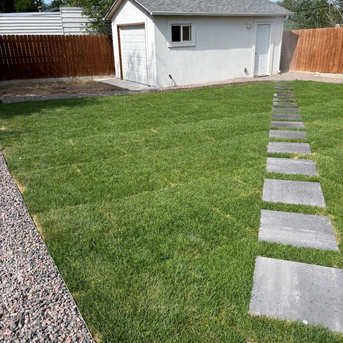 Clean, green, and functional 🌿
We transformed this backyard with fresh sod installation, a modern paver walkway, and low-maintenance rock border. Simple upgrades that make a big impact!

#Landscaping #BackyardUpgrade #SodInstallation #PaverWalkway #