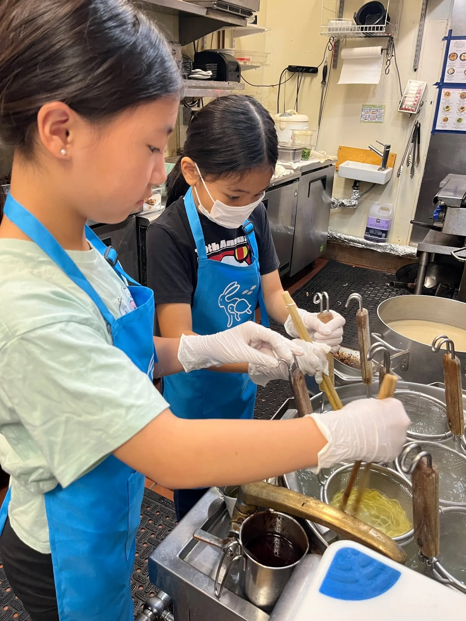 Today, our kids stepped into a real ramen shop kitchen at Kamitoku Ramen 🍜✨
@kamitoku_ramen.hawaii 

They became Junior Ramen Shop Staff for the day &mdash;
making ramen, folding gyoza, preparing drinks, and learning what it really means to work in 