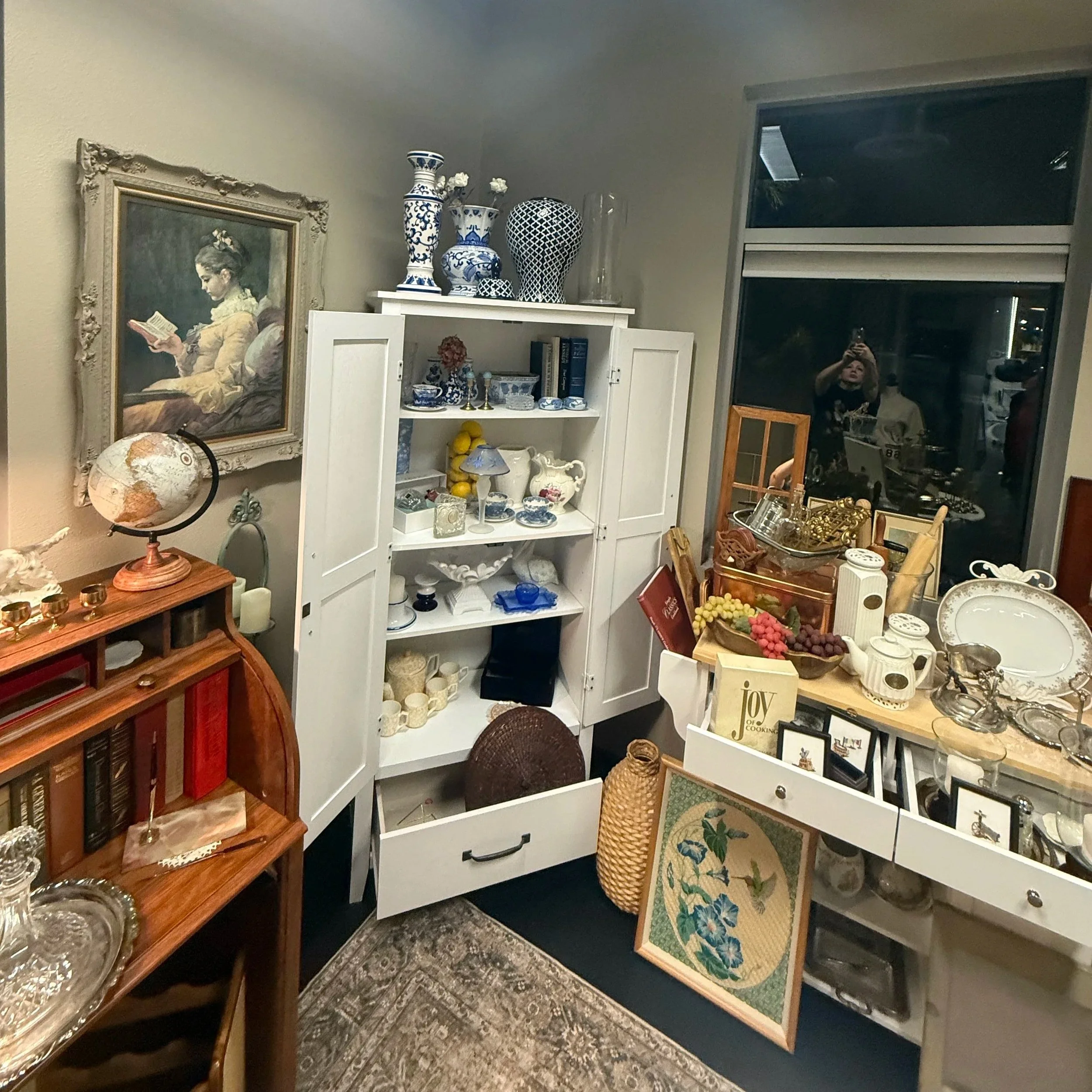 Runway Vintage boutique inside Runway Salon in Coeur d’Alene featuring curated vintage home décor, furniture, and timeless collected pieces.