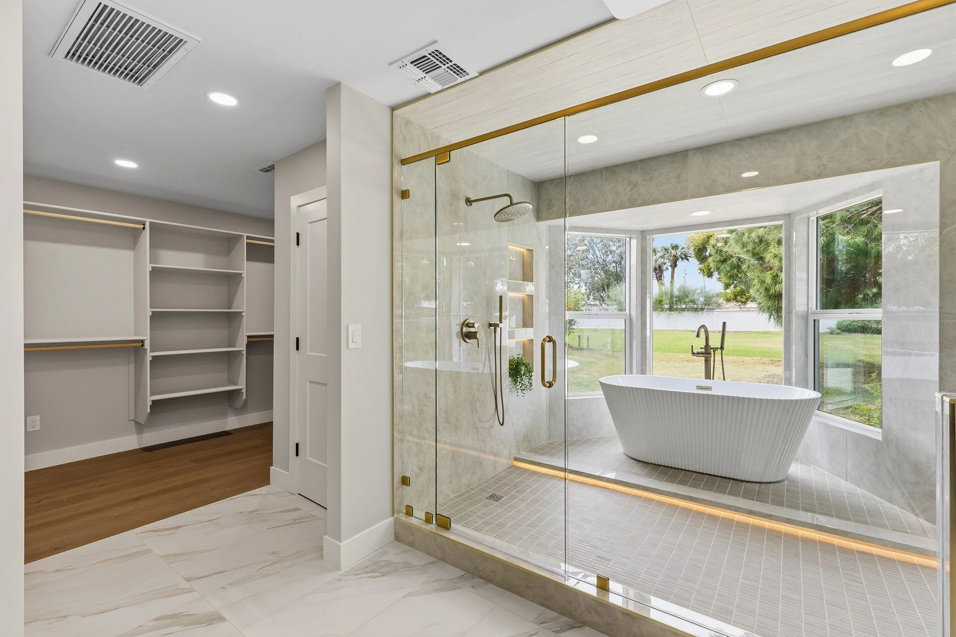 Master Closet/Bathroom After (closed in access to outside, added closet and repositioned bathroom)