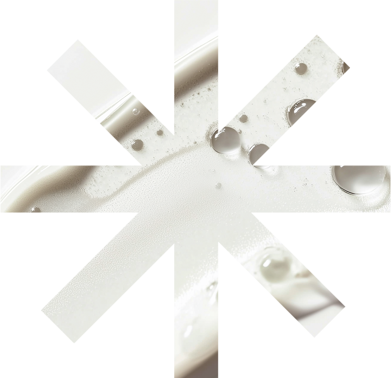 Close-up of milk with bubbles and foam.