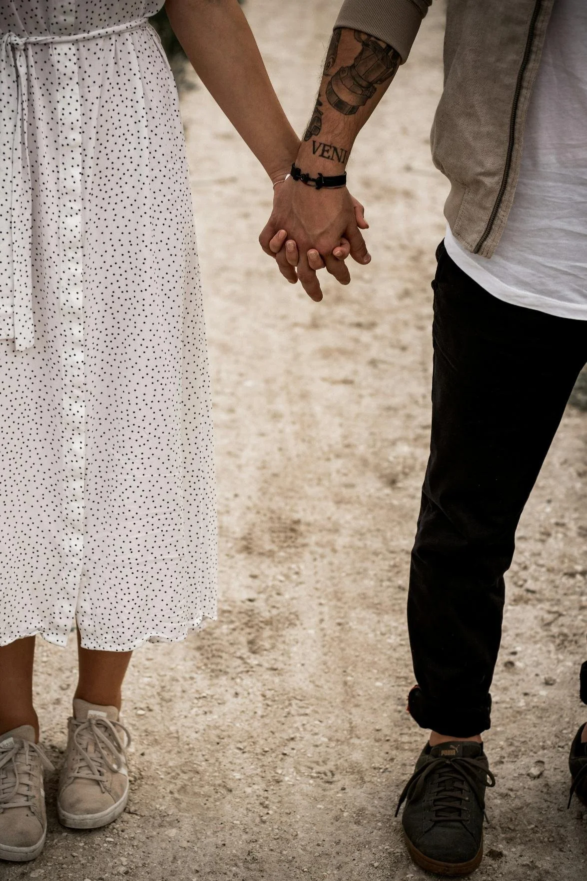 Image of couple holding hands. How can relationship problems suggest unresolved trauma?