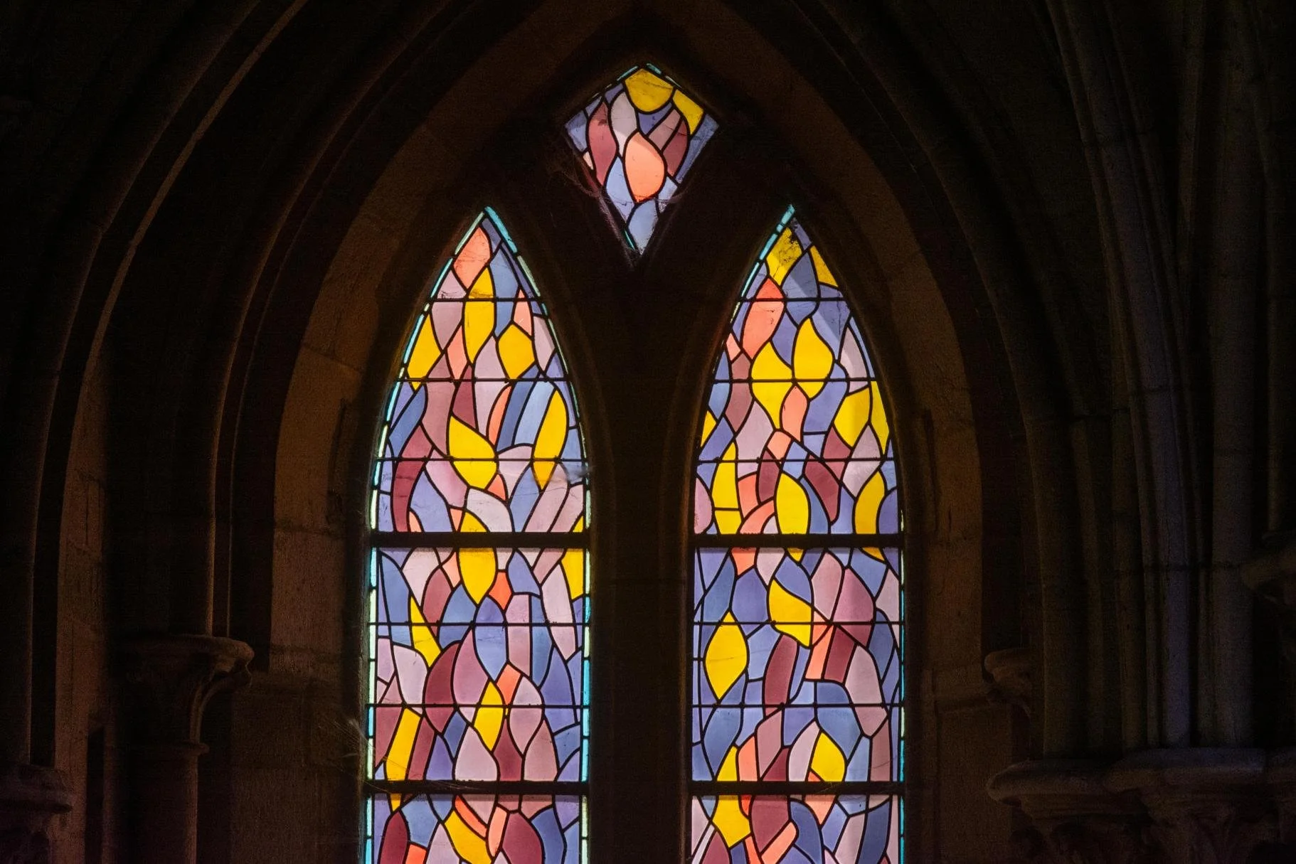 Religious Trauma Therapy Bay Area. Stained glass cathedral windows image.
